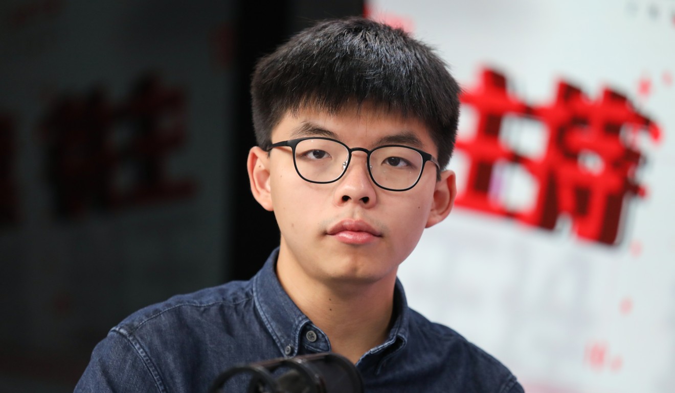 Activist Joshua Wong has been banned from running in the district council elections. Photo: Nora Tam