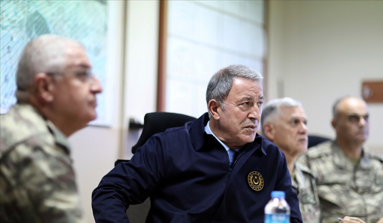 Turkish Defence Minister Hulusi Akar meets the commanders of the Turkish troops in Sanliurfa region and the commander of a unit in Tel Abyad. Photo: Turkish Ministry of National Defence via dpa