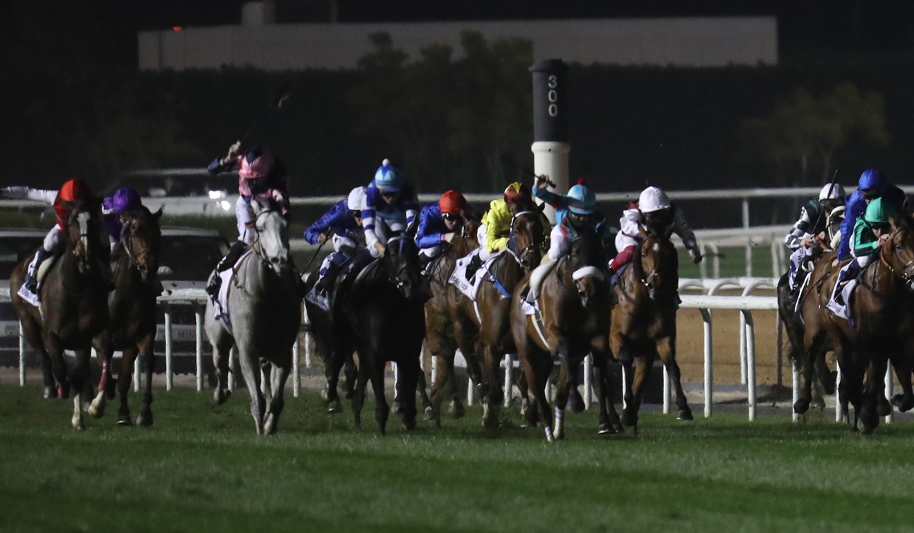 Almond Eye begins to kick clear at Meydan to win the Dubai Turf.