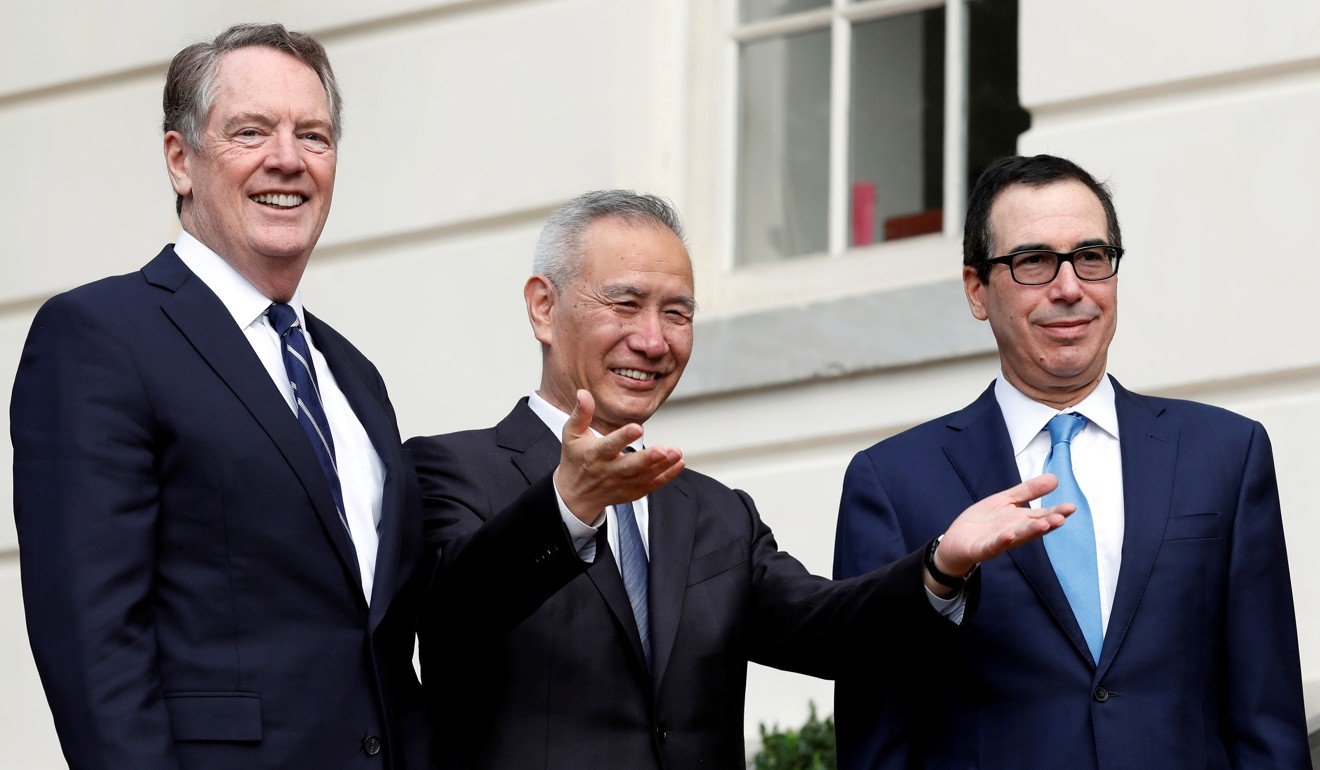 China’s Vice Premier Liu He (centre) gestures to the media between US Trade Representative Robert Lighthizer (left) and Treasury Secretary Steve Mnuchin before trade negotiations in Washington on October 10. Photo: Reuters