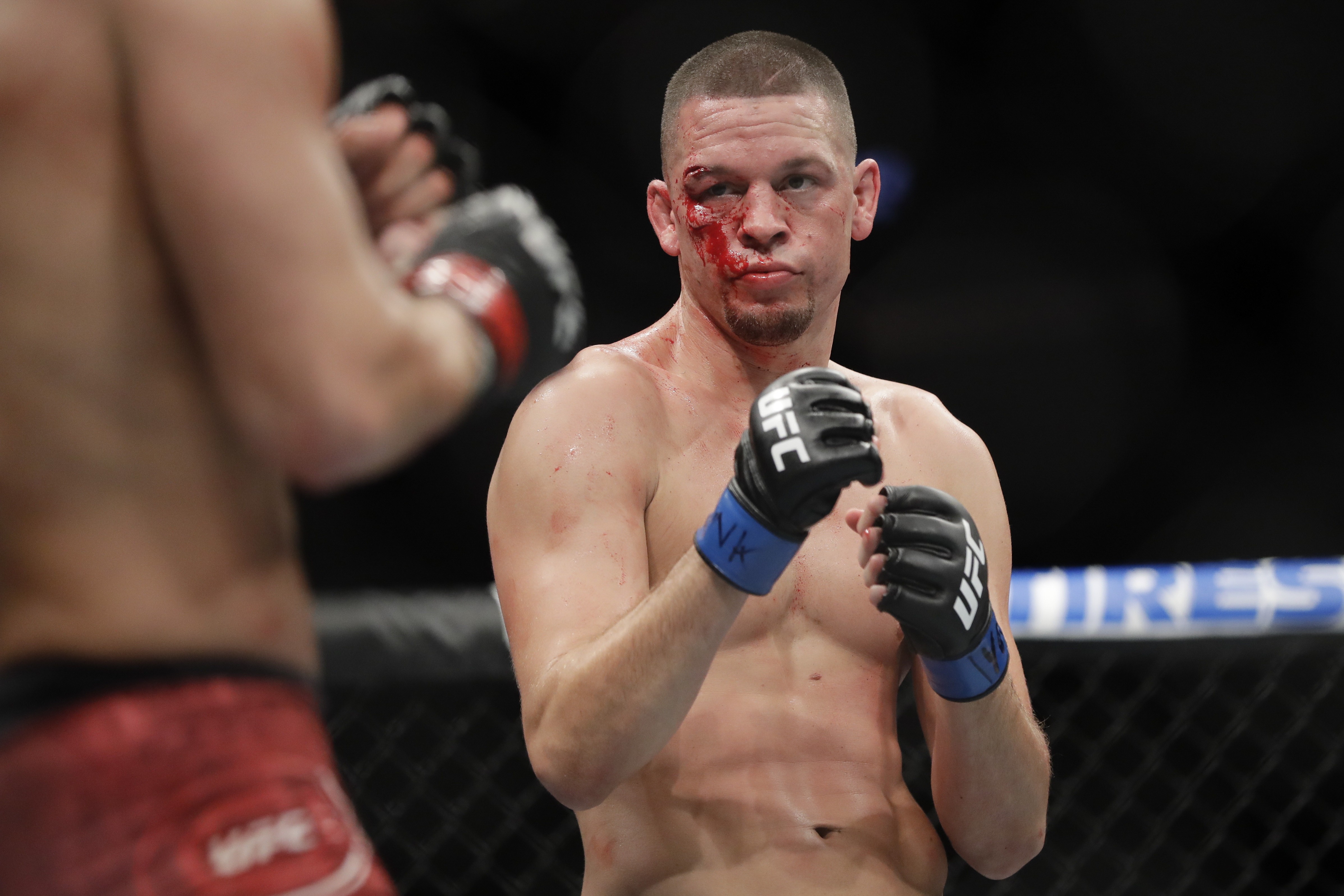 Nate Diaz fights Jorge Masvidal during the first round at UFC 244. Photo: AP