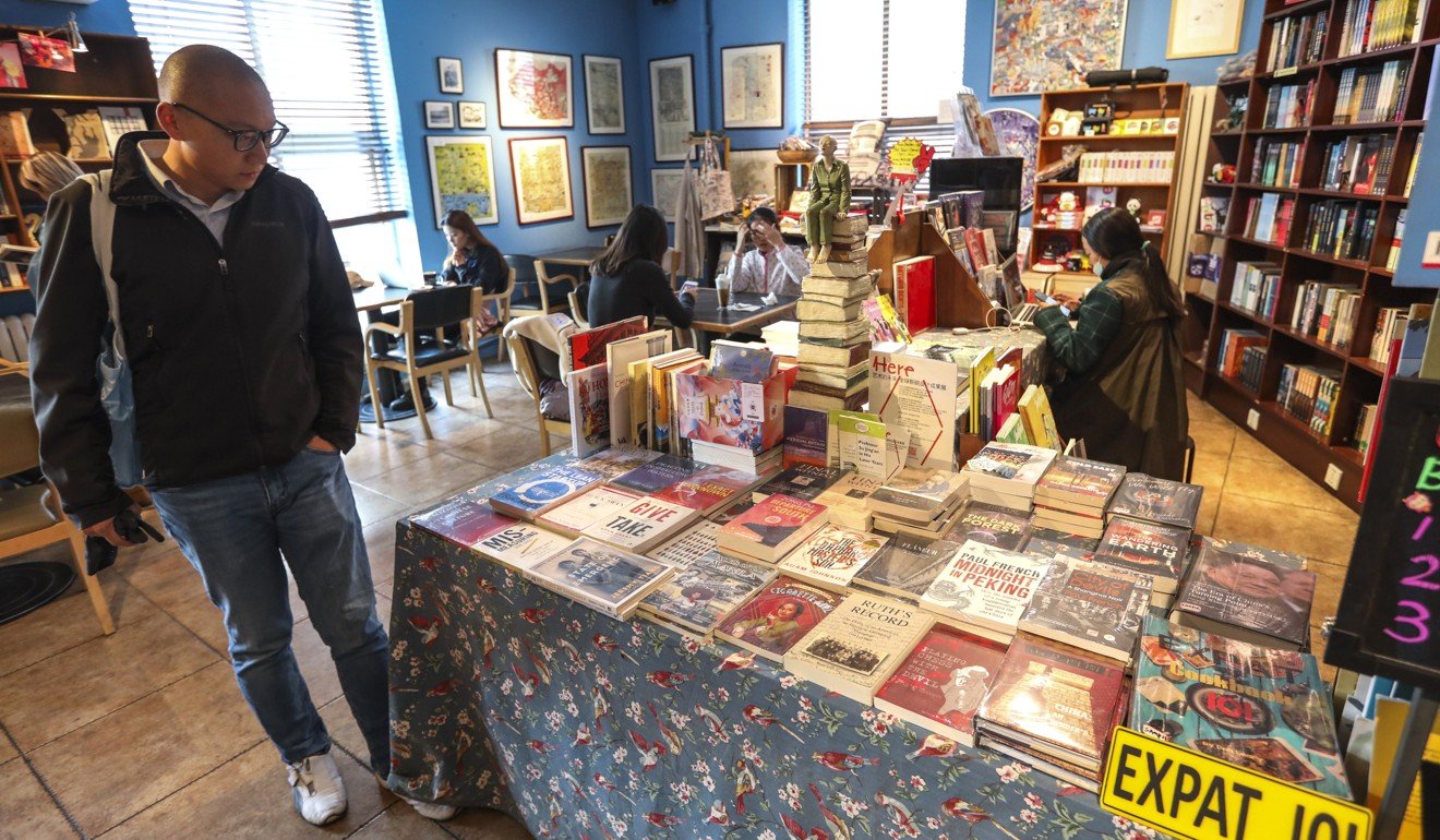 Customers browse books in The Bookworm in Sanlitun, Beijing, on Tuesday. Photo: Simon Song