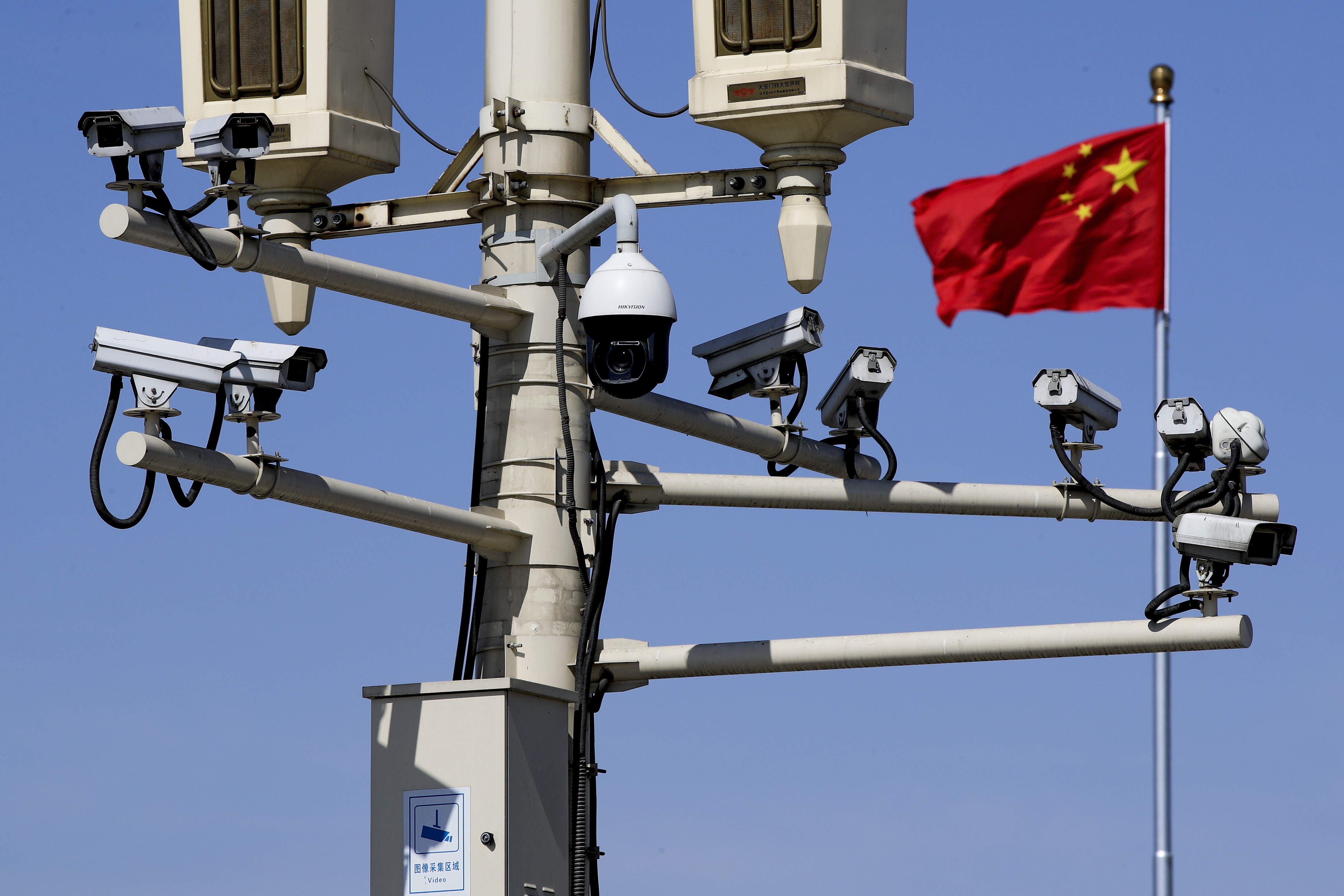 China’s corporate social credit system will require companies to report enormous amounts of data to Chinese officials, including information on their business partners. Photo: AP