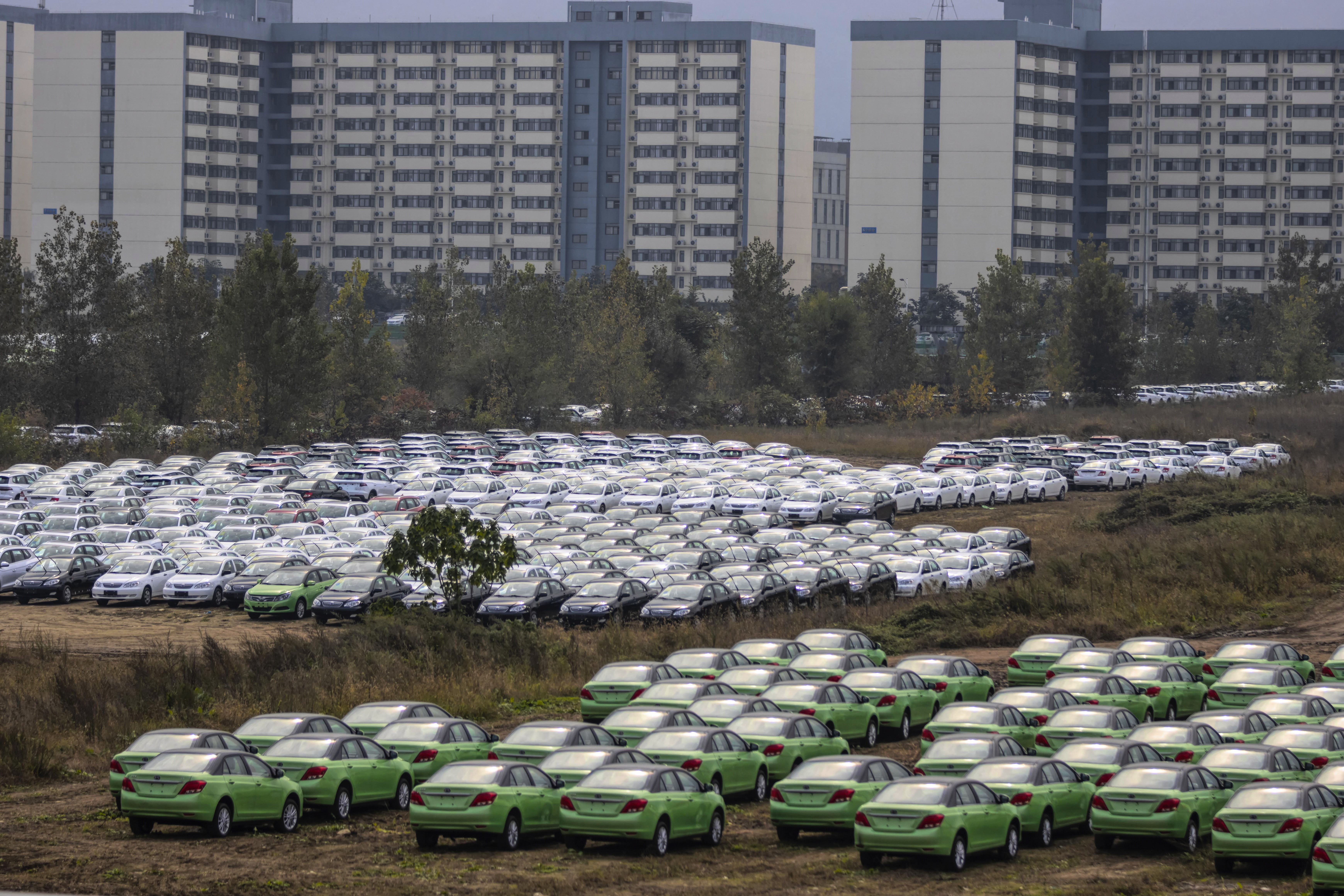 New cars are lined up at a BYD factory in Xian, Shaanxi province. China’s economic output has slowed to the critical level of 6 per cent in the third quarter of the year. Photo: EPA-EFE
