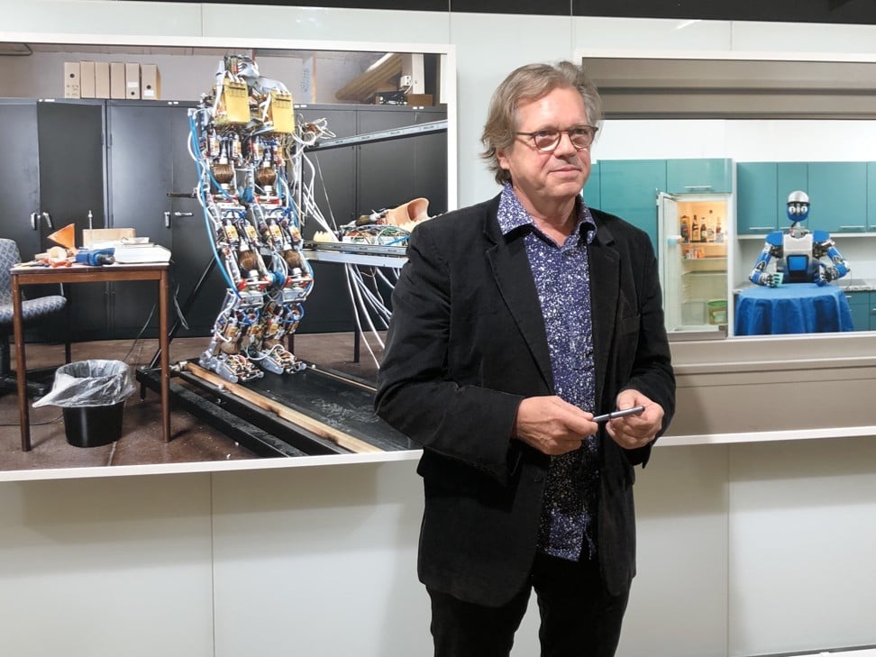 French artist Yves Gellie explains some of his work at the opening of “The Age of Robots” exhibition at Baptist University, Hong Kong. Photo: Gigi Choy