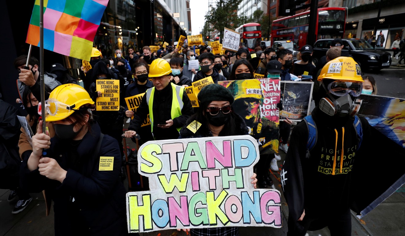 Demonstrators in London march during a ‘Stand with Hong Kong’ rally on November 2, 2019. Photo: Reuters