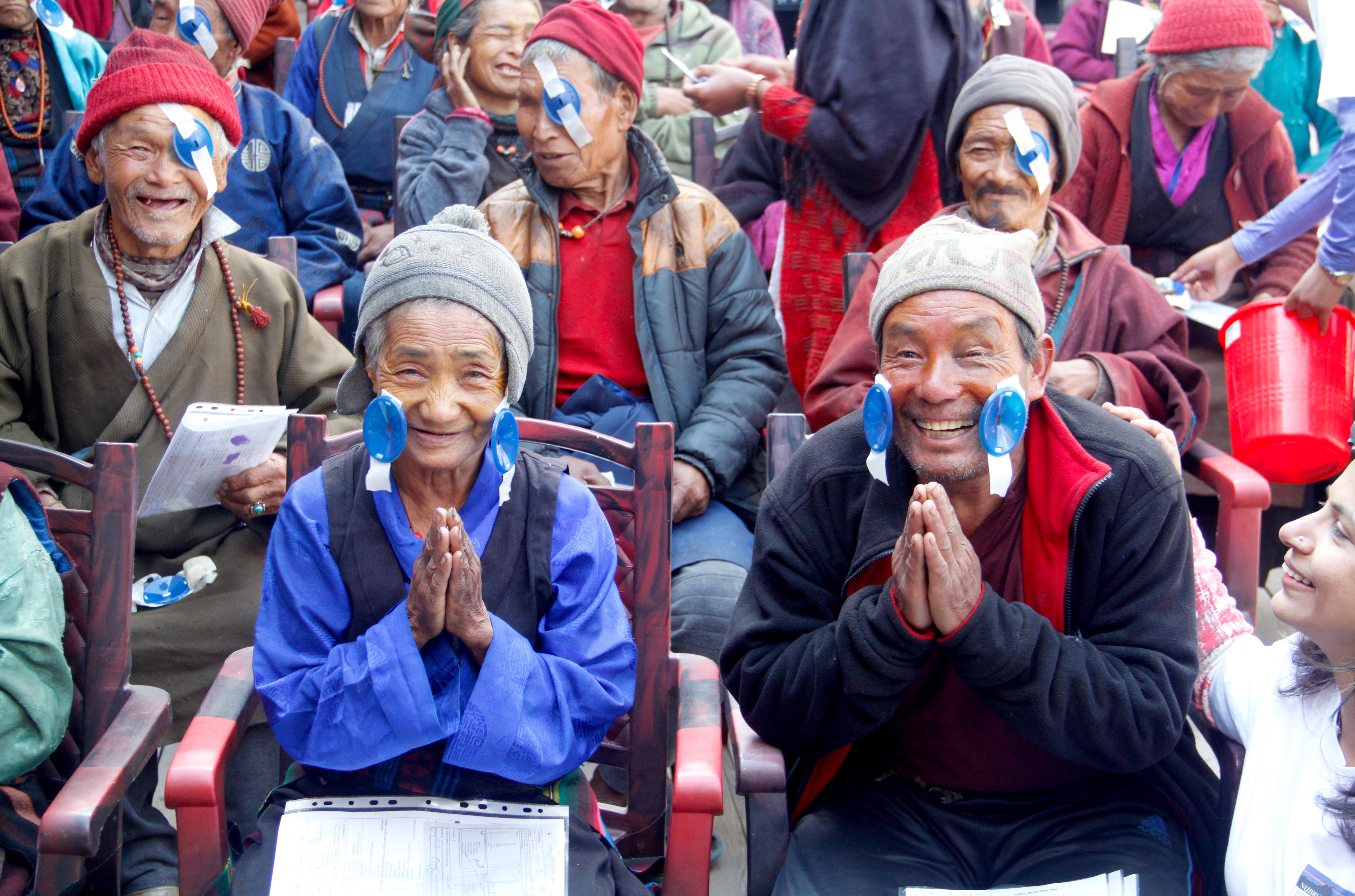 Villagers from Nepal’s Nubri Valley who can now see after being partially or completely blind for years thanks to free eye clinics set up as part of a language preservation project. Photo: Cathryn Donohue