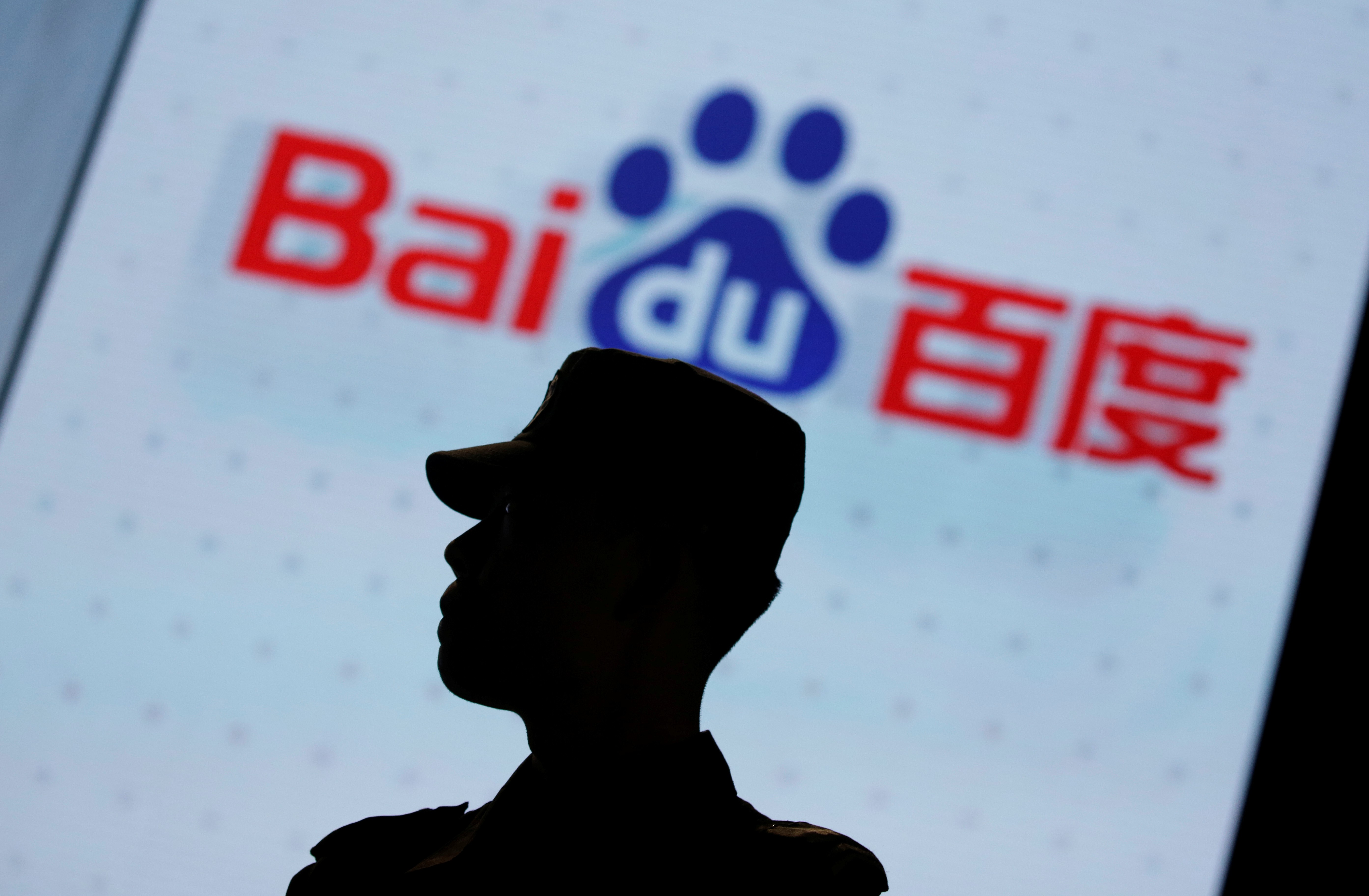 A security personnel stands guard at the opening session of Baidu's annual AI developers conference Baidu Create 2019 in Beijing, China, July 3, 2019. Photo: Reuters