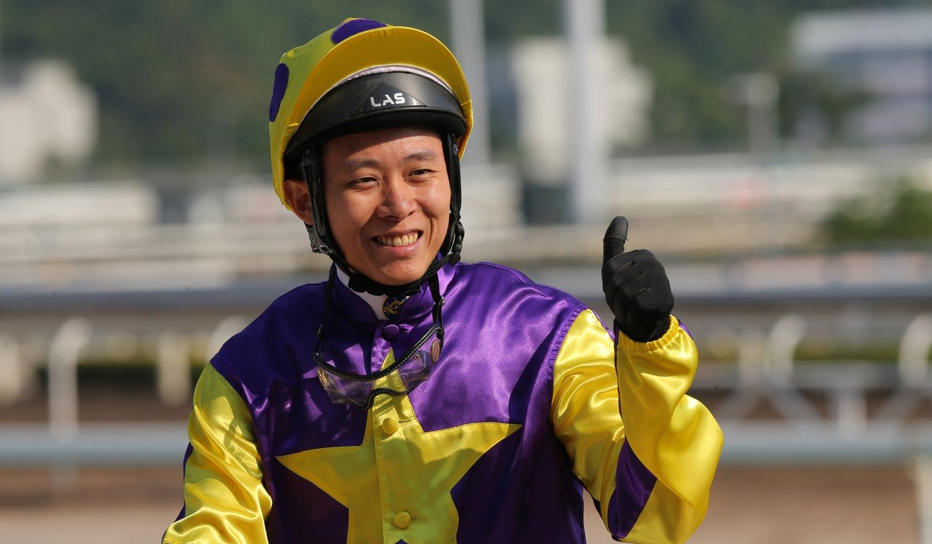 Alex Lai salutes after winning on Mongolian Legend.