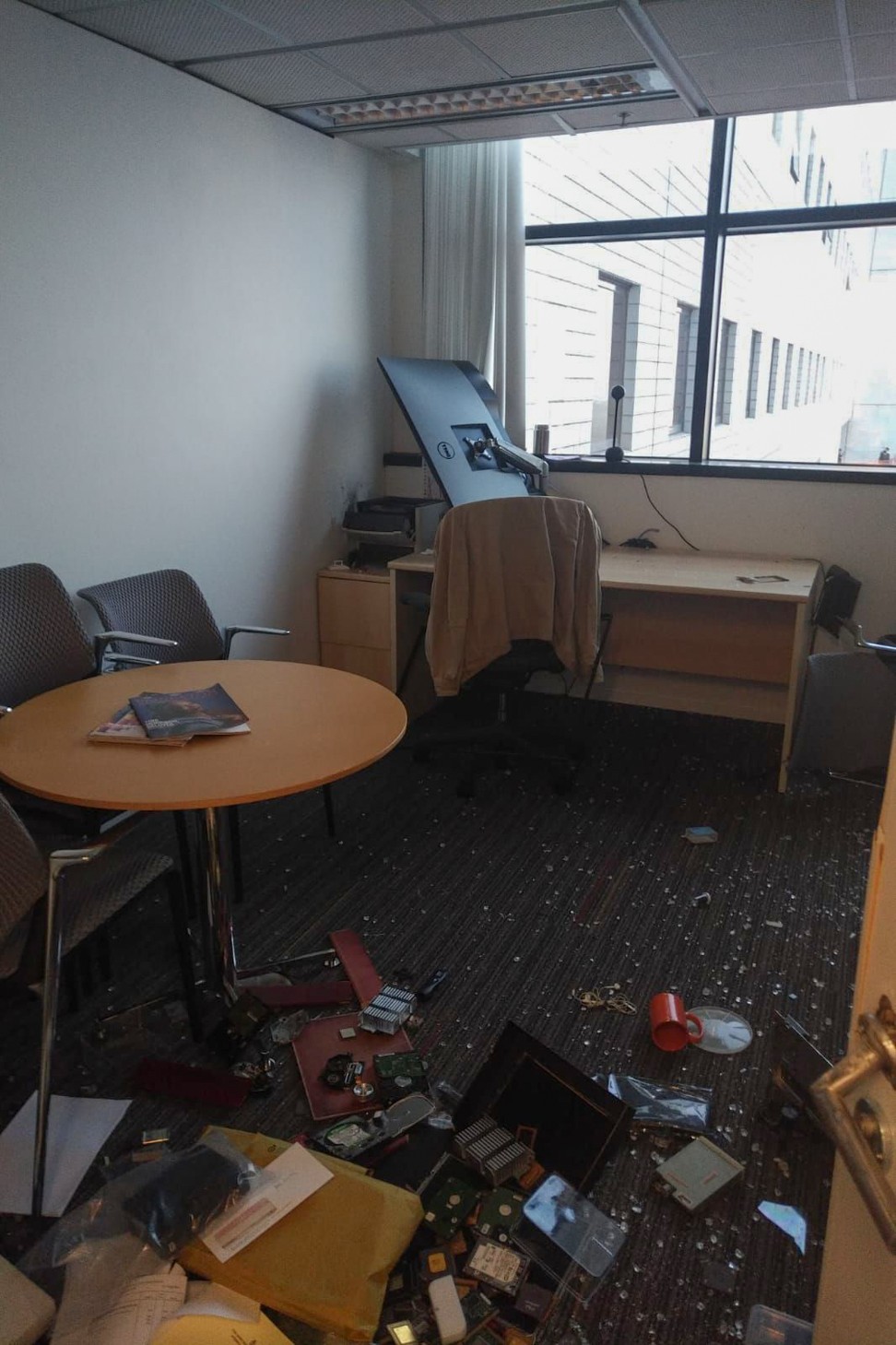 The office of Professor Xu Jiang, a mainlander teaching in the department of Electronic and Computer Engineering, was smashed by violent protesters on Friday. Photo: Xu Jiang