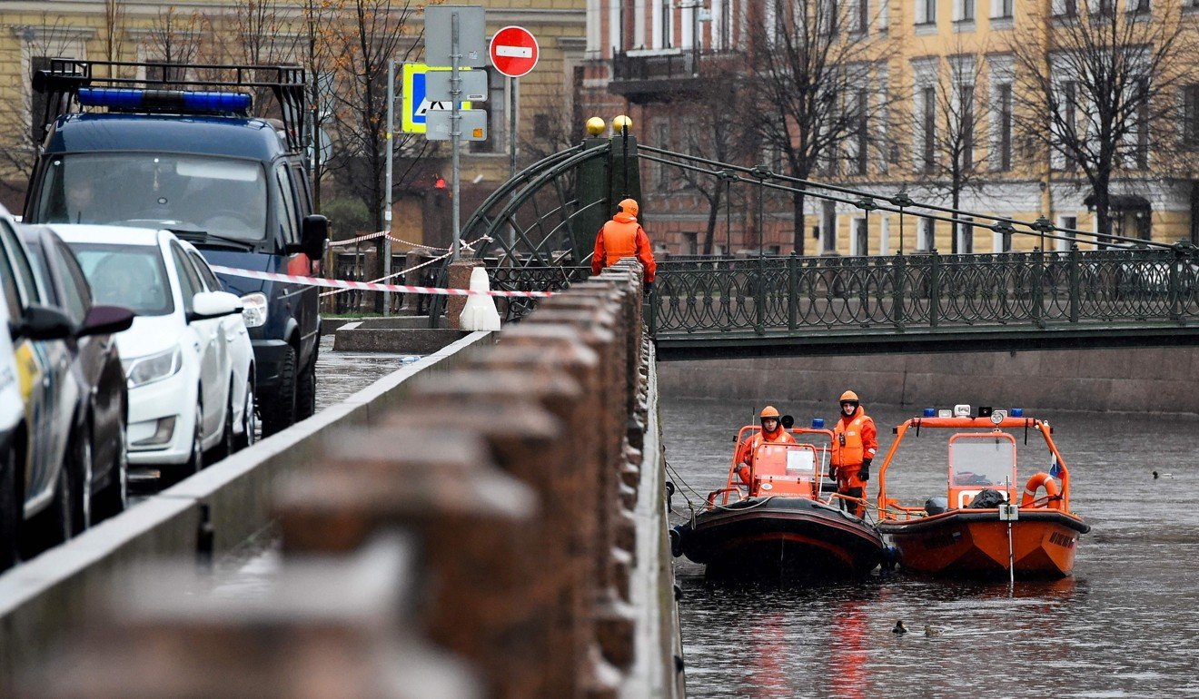 Russian investigators search the Moika River in Saint Petersburg. Photo: AFP