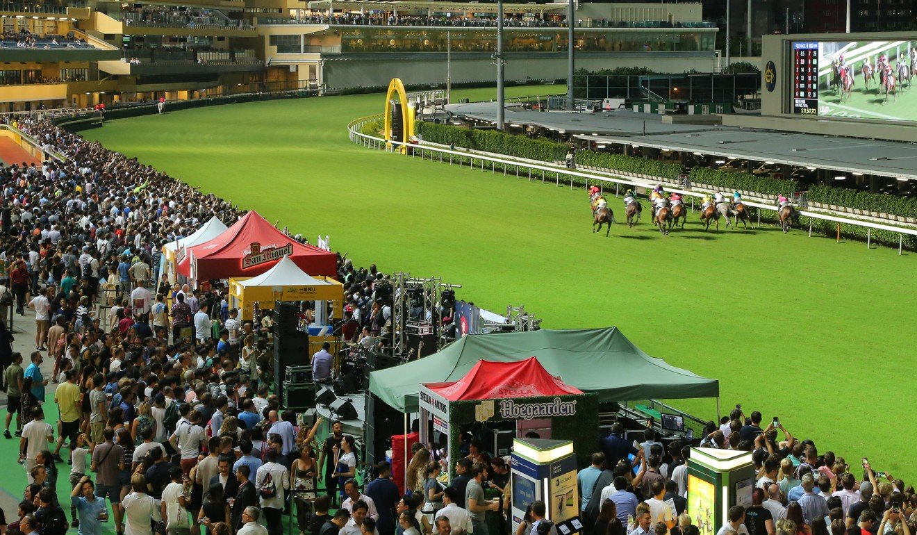 Horses race at Happy Valley.