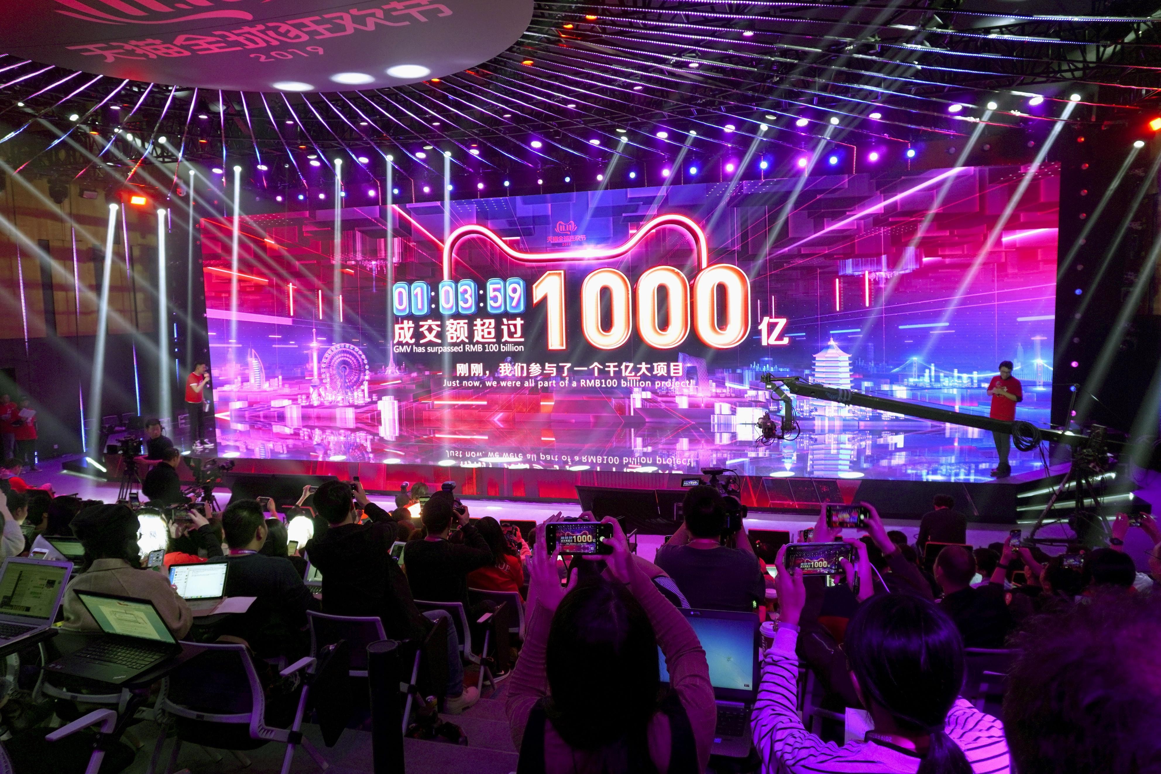 A display set up at an event in Hangzhou for China’s Singles’ Day sales campaign shows sales on Alibaba Group’s e-commerce platform hitting 10 billion yuan (about US$1.43 billion) just 1 minute and 36 seconds after midnight. Photo: Kyodo