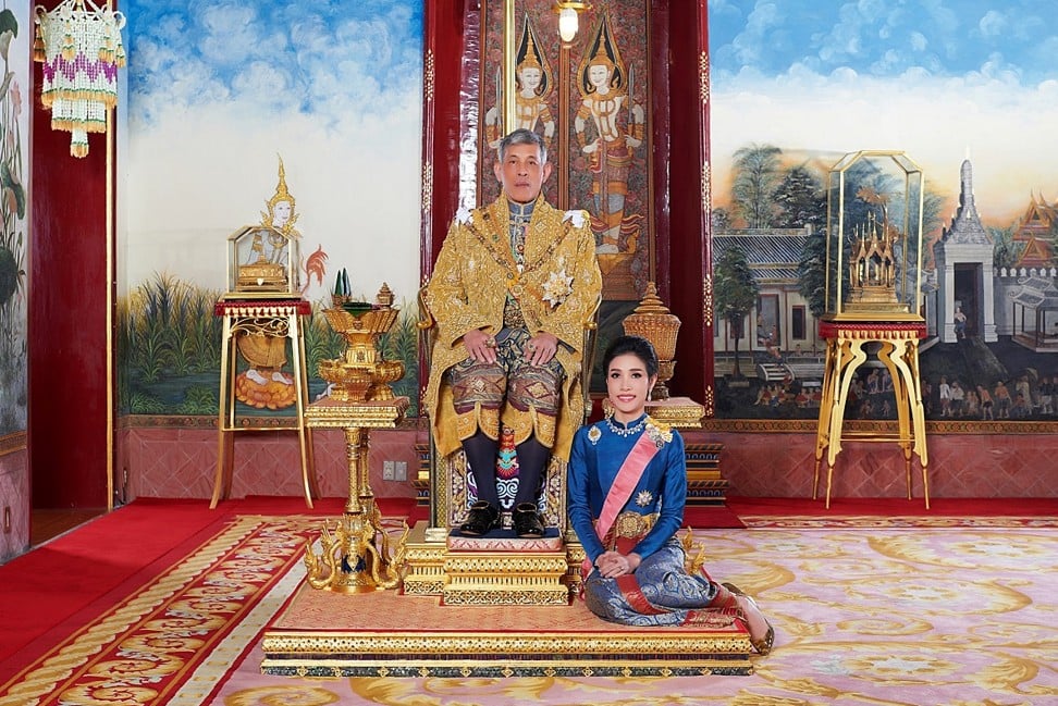 Thailand's King Maha Vajiralongkorn and General Sineenat Wongvajirapakdi, the royal consort, pose at the Grand Palace in Bangkok, Thailand. Photo: Reuters