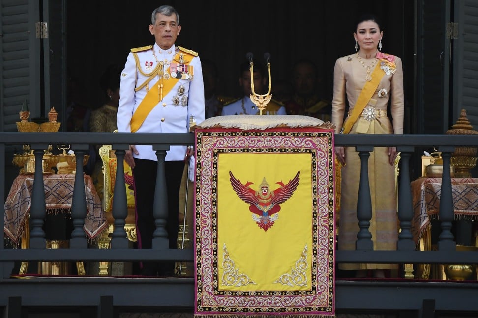 Thailand's King Maha Vajiralongkorn and Queen Suthida appear on the balcony of Suddhaisavarya Prasad Hall of the Grand Palace in Bangkok. Photo: Jewel Samad/Agence France-Presse
