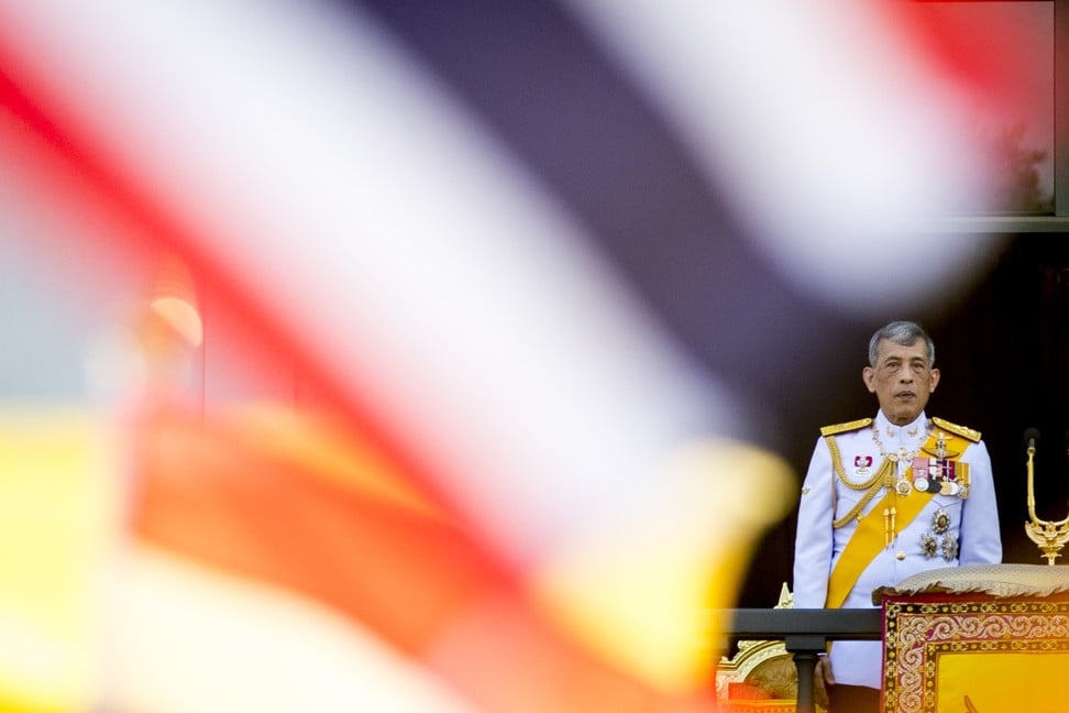 Thai King Maha Vajiralongkorn greets well-wishers from a balcony of the Suddhaisavarya Prasad Hall in the Grand Palace as part of his royal coronation in Bangkok on May 6, 2019. Photo: EPA-EFE