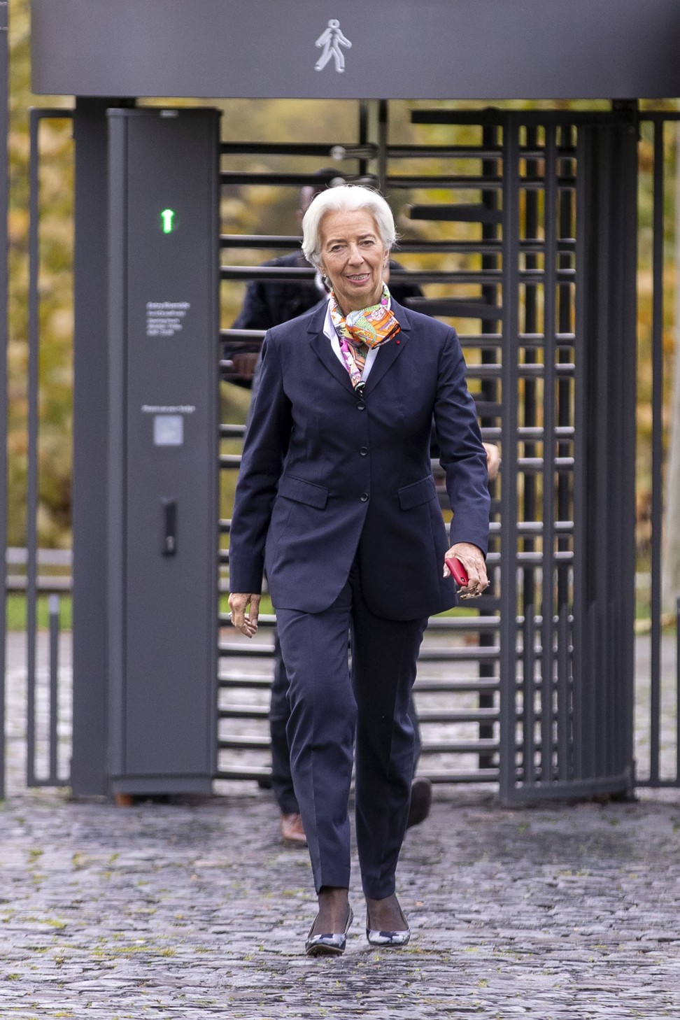 Christine Lagarde, the new president of the European Central Bank, passes through a turnstile gate as she arrives at the bank’s building in Frankfurt on November 4. Photo: Bloomberg