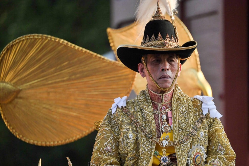 Thailand's King Maha Vajiralongkorn is carried in a golden palanquin out of the Grand Palace for the coronation procession in Bangkok on May 5, 2019. Photo: AFP