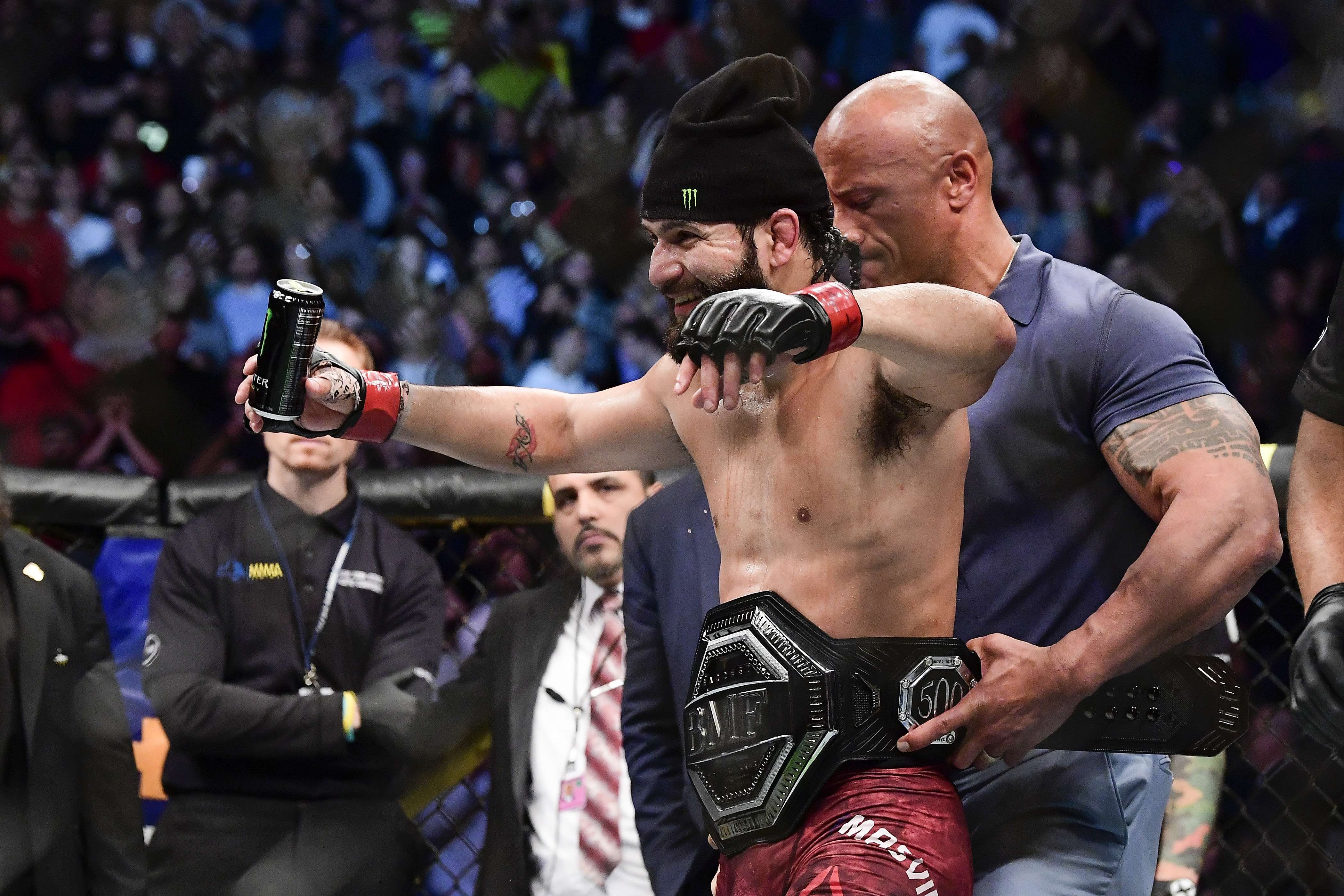 Jorge Masvidal is awarded the ‘BMF’ belt by Dwayne ‘The Rock’ Johnson at UFC 244. Photo: AFP