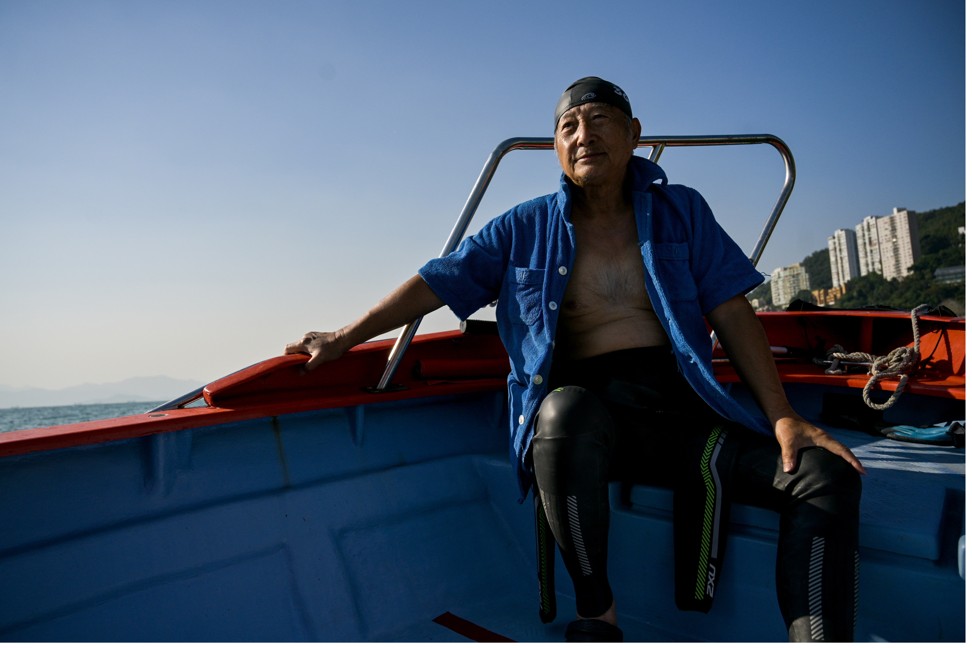 Fong’s dad was ready for a dip as he followed his son’s progress from a support boat.