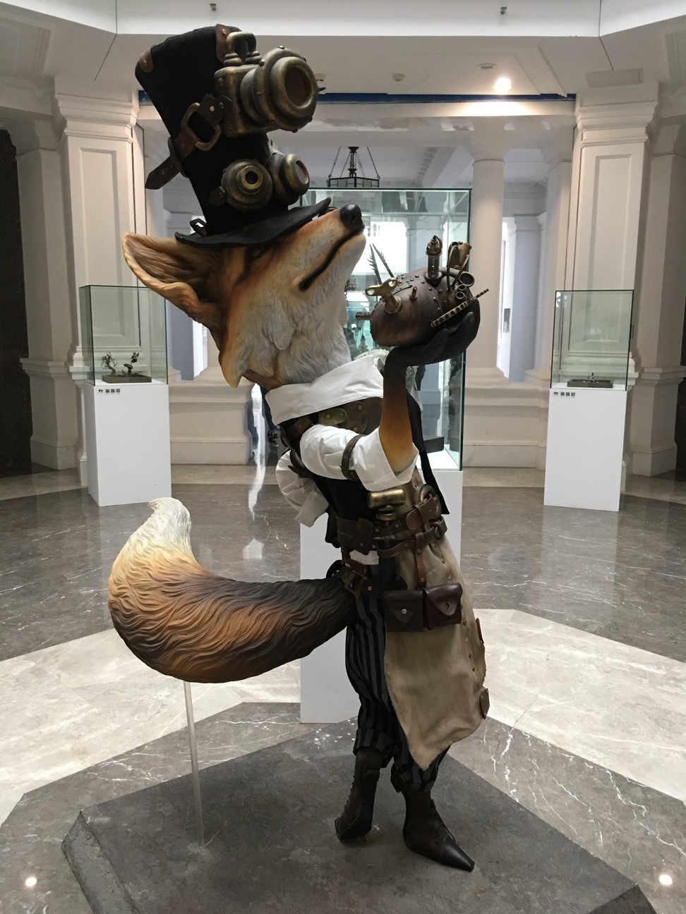 A steampunk fox statue, designed by Manas Workshop, on display during a computer graphics and design exhibition in the Beijing Fun shopping district in the Chinese capital last month. Photo: Elaine Yau