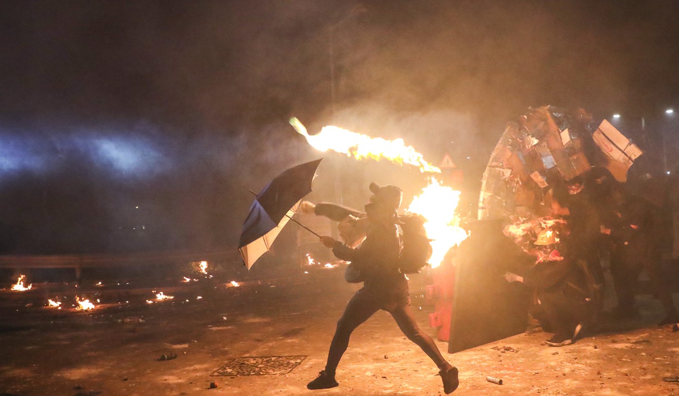 Riot police and students clash at the Chinese University of Hong Kong in Sha Tin. Photo: Sam Tsang