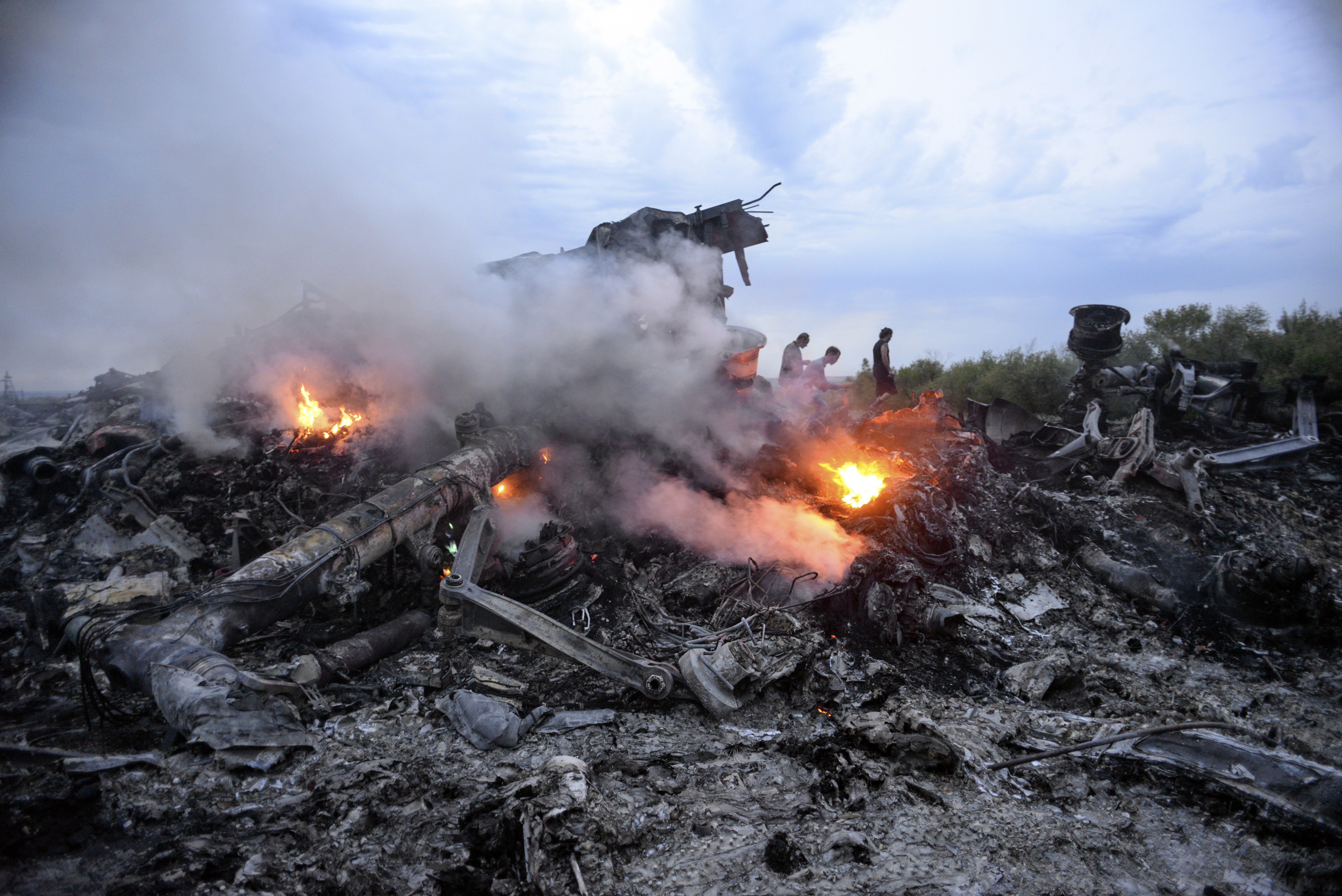 The remains of Malaysia Airlines flight 17 after it crashed while flying over eastern Ukraine. Photo: EPA