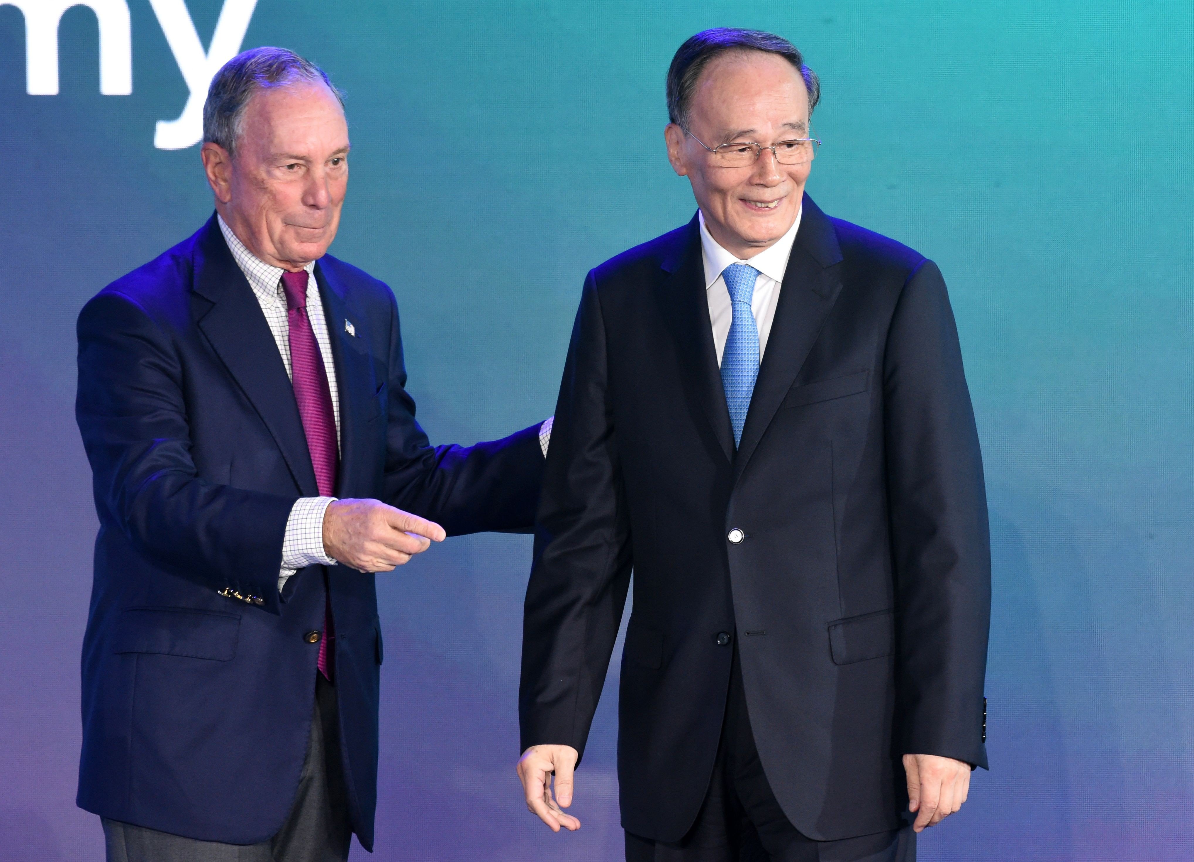 Billionaire Michael Bloomberg and Chinese vice-president Wang Qishan at the Bloomberg New Economy Forum in Singapore in November 2018. Photo: AFP