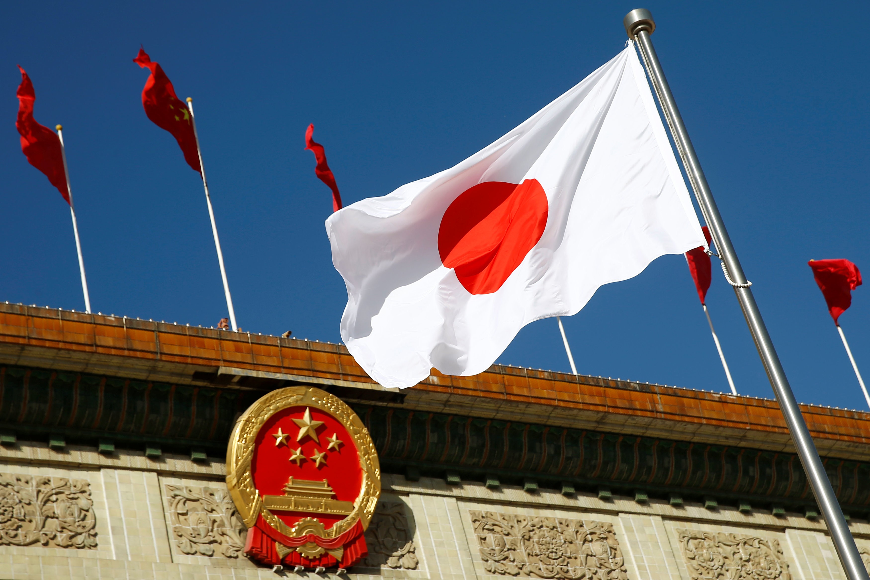 Japan's flag flutters outside the Great Hall of the People in Beijing. Photo: Reuters