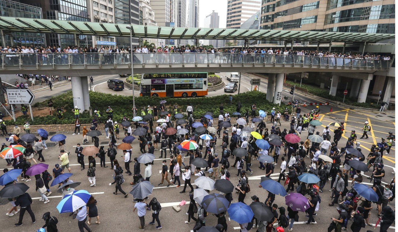 Protesters rally in Central during their lunch breaks. Photo: May Tse