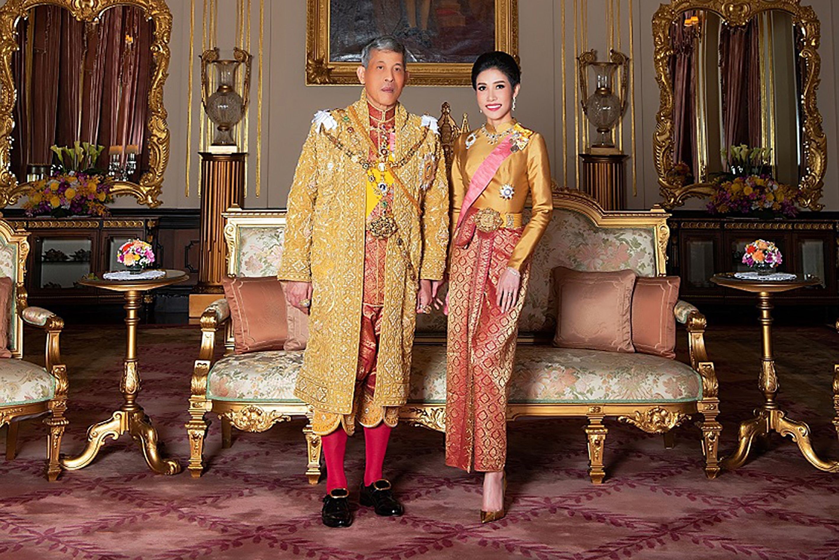 Thailand's King Maha Vajiralongkorn poses with former royal noble consort Sineenat Bilaskalayani, also known as Sineenat Wongvajirapakdi, who was dramatically stripped of all her royal titles by the palace on October 21 – a shock move less than three months after she was bestowed with a position that had not been used for nearly a century. Photo: AFP/Thailand’s Royal Office