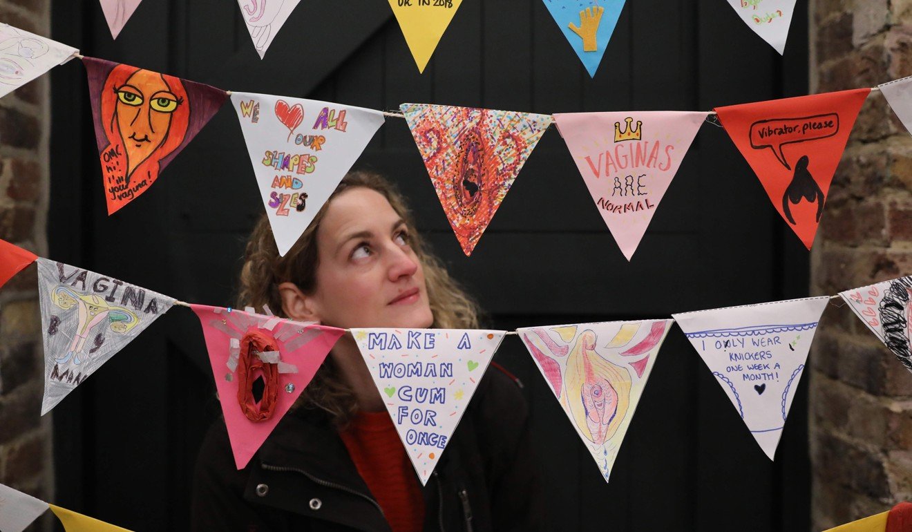 A visitor looks at a line of vagina-themed bunting at the new Vagina Museum in London on Thursday. Photo: AFP