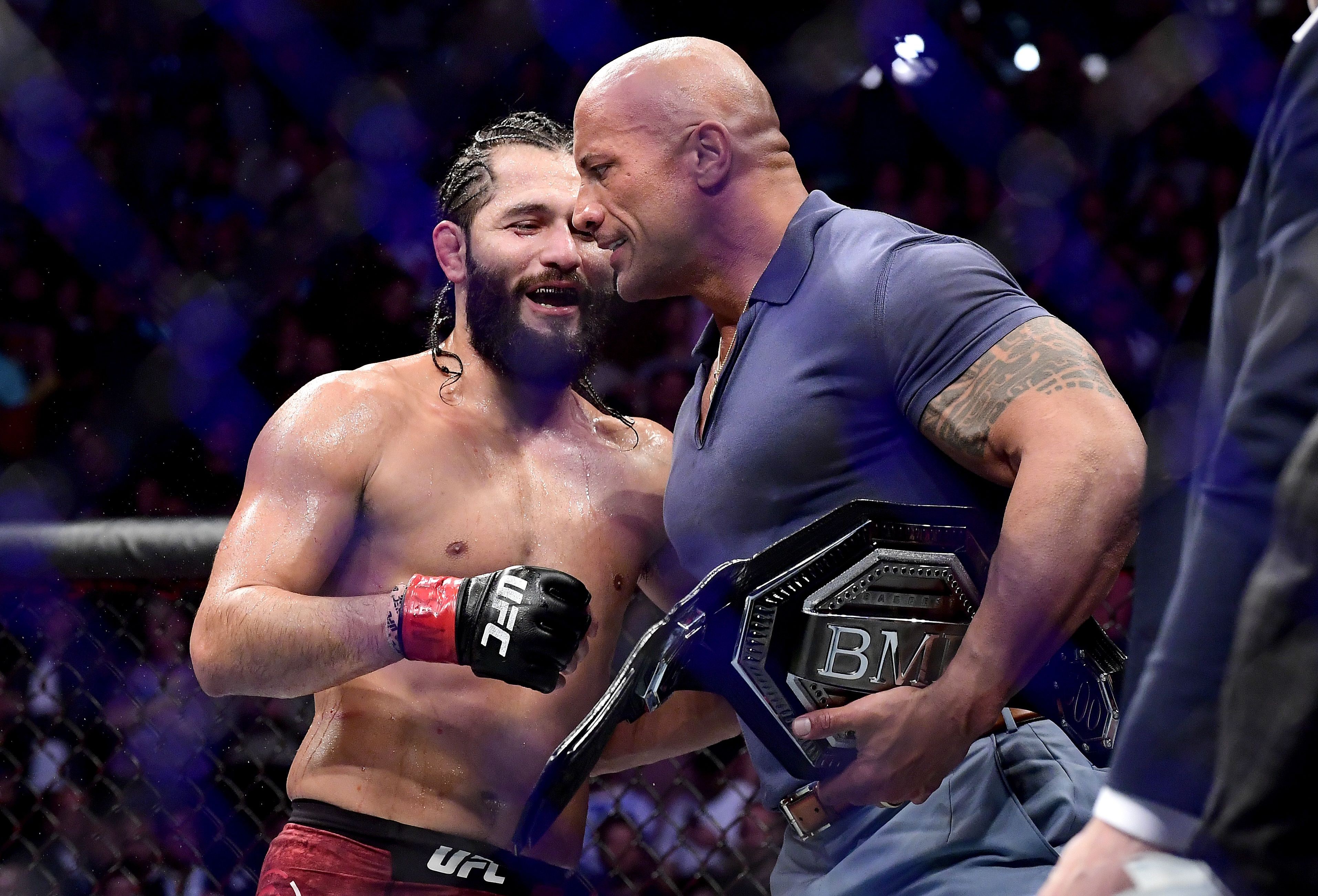 Jorge Masvidal is awarded the ‘BMF’ belt by Dwayne ‘The Rock’ Johnson after his victory by TKO on a medical stoppage against Nate Diaz at UFC 244. Photo: AFP