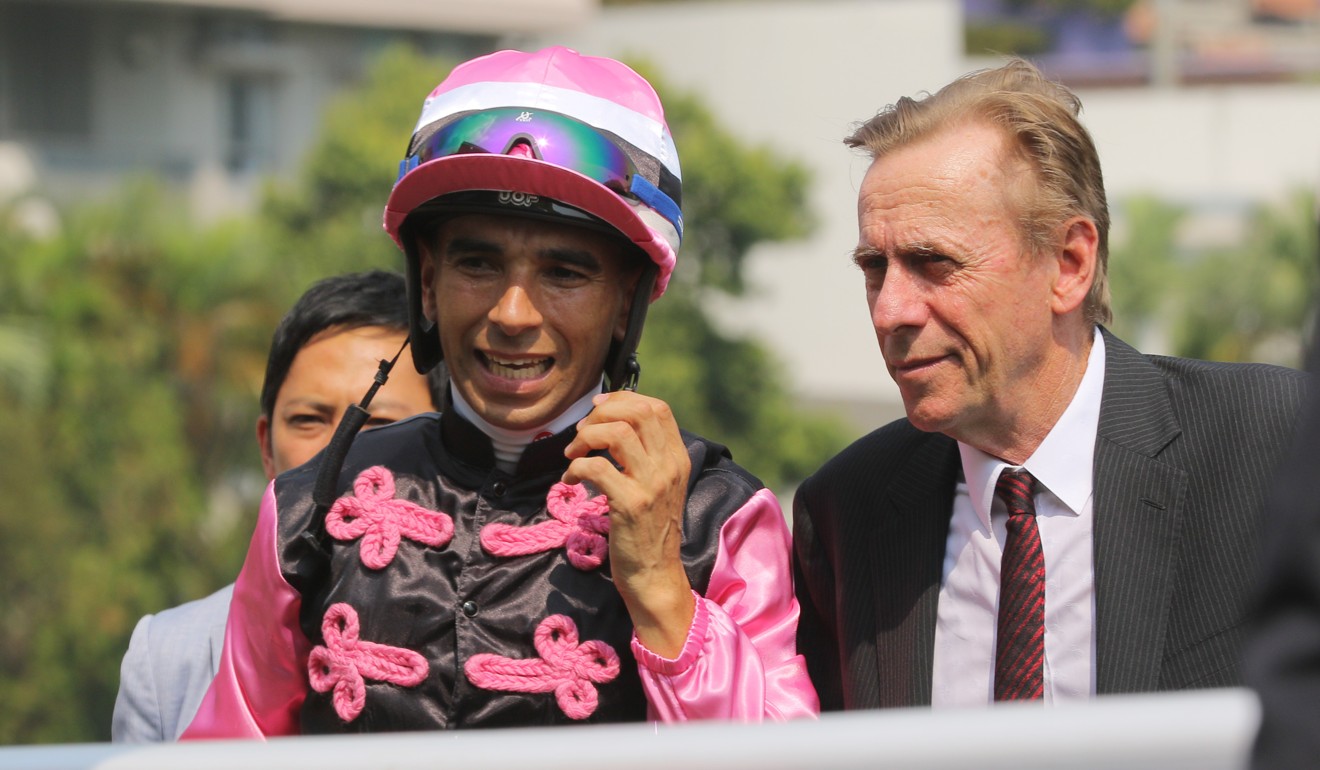 Jockey Joao Moreira and John Size after a win from Full Of Beauty.