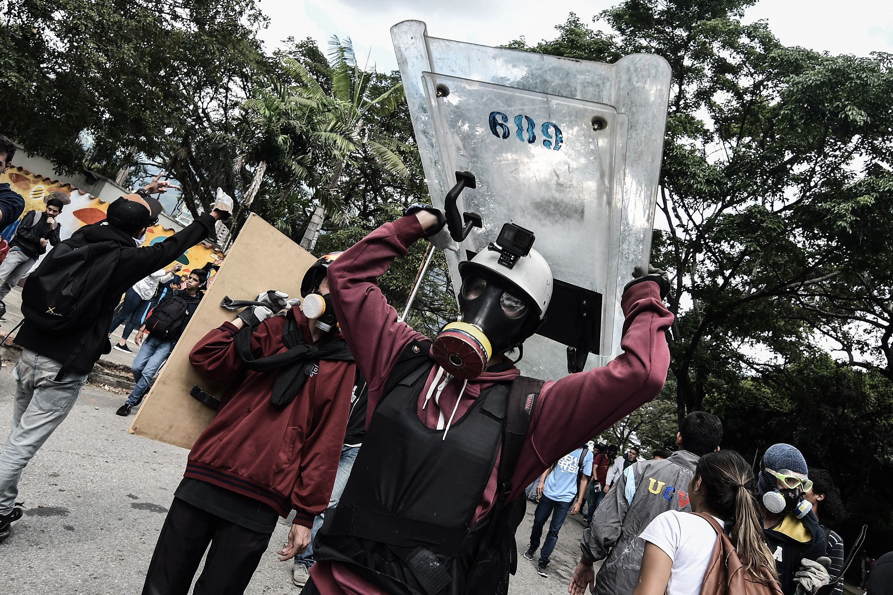 A protester with a riot shields and a gas mask during the demonstrations. Photo: SOPA Images via ZUMA Wire