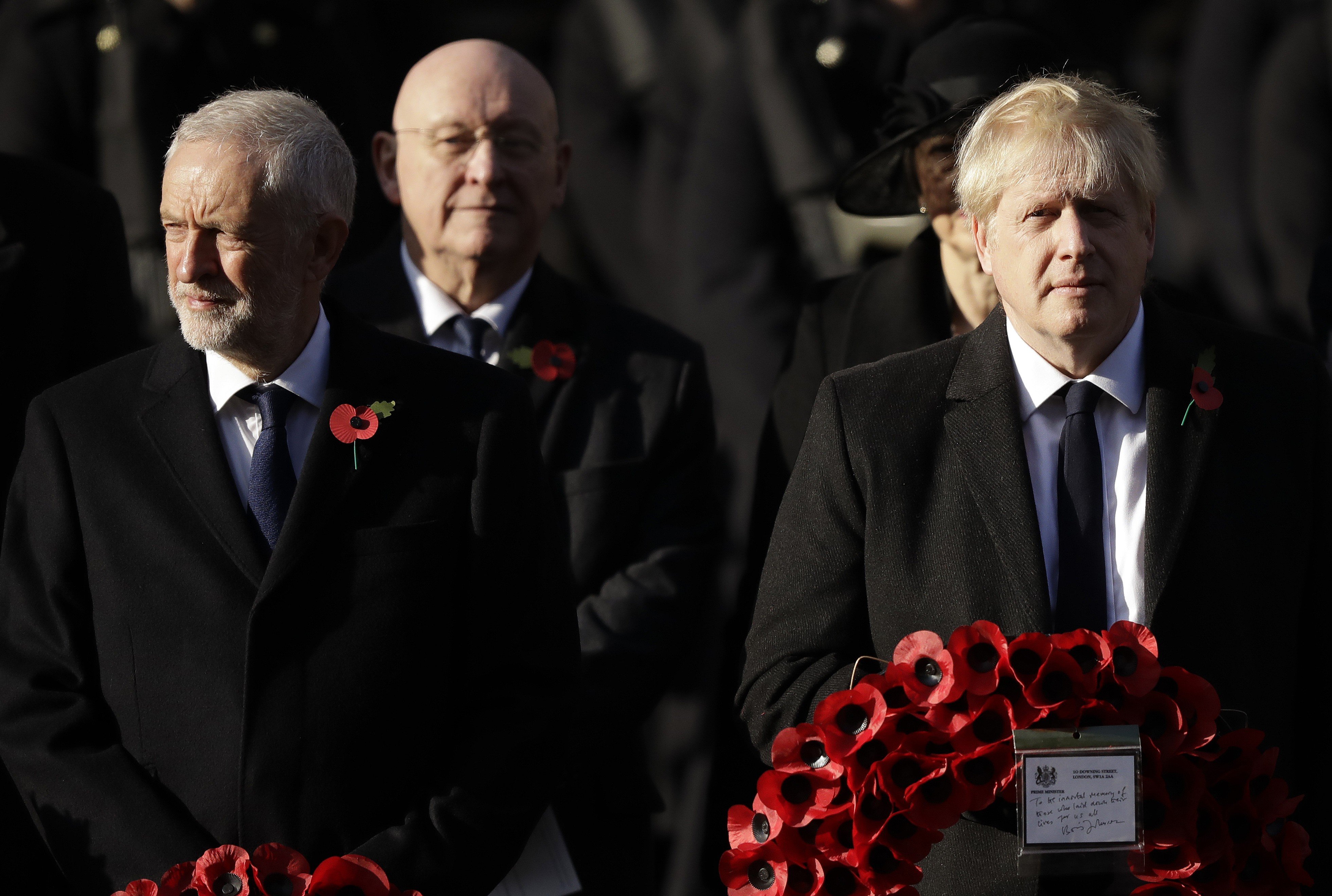 British Prime Minister Boris Johnson (right) and leader of the Labour Party Jeremy Corbyn prepare to lay wreaths during the Remembrance Sunday ceremony at the Cenotaph in Whitehall in London on November 10. Photo: AP