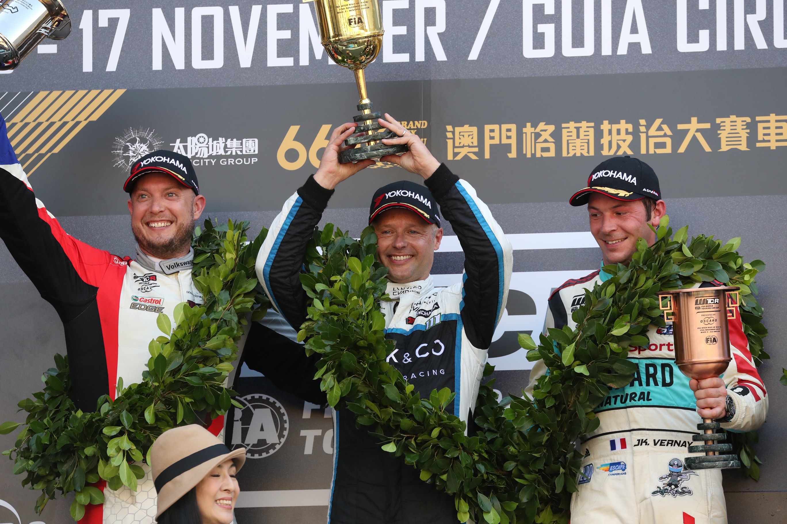 Andy Priualx (centre) tops the podium ahead of Rob Huff (left) and Jean-Karl Vernay (right) at the Macau Grand Prix. Photo: K. Y. Cheng