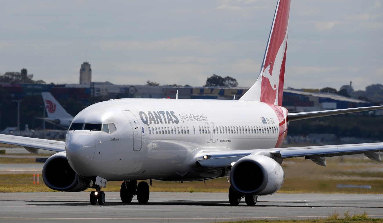 A Qantas Boeing 737-800 aircraft is seen taxiing at Sydney Airport. Photo: EPA