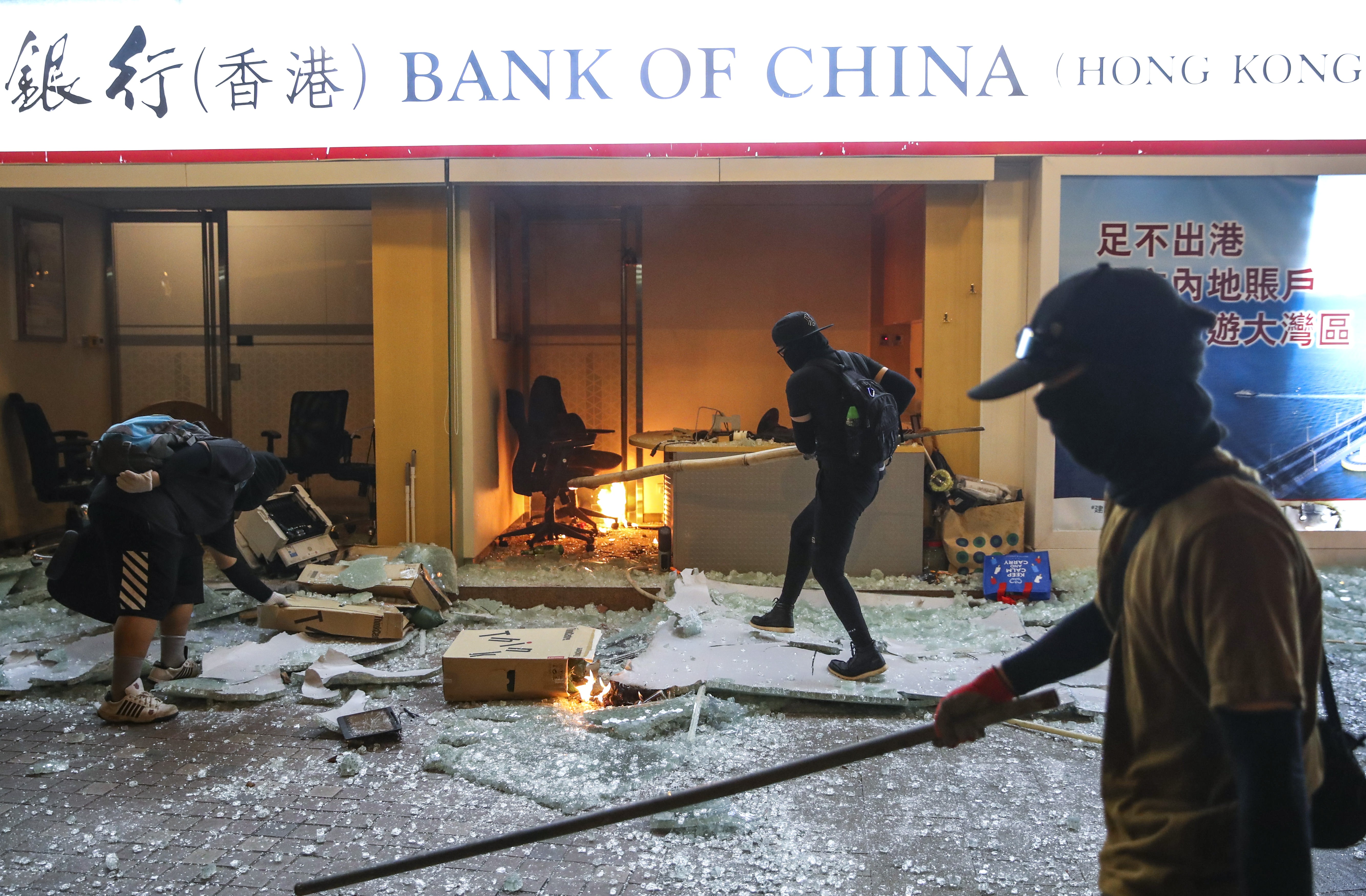 Protesters set a Bank of China branch on fire on Sha Tsui Road in Tsuen Wan on October 4 following a rally against the anti-mask law introduced by the government. Photo: Winson Wong
