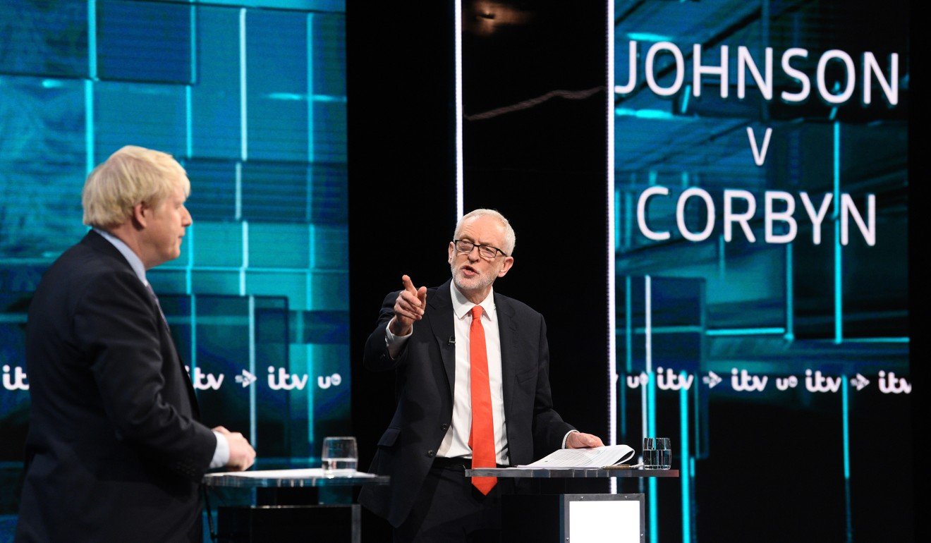 British Prime Minister and Conservative Party leader Boris Johnson and Labour Party leader Jeremy Corbyn during the live debate. Photo: Handout via EPA-EFE