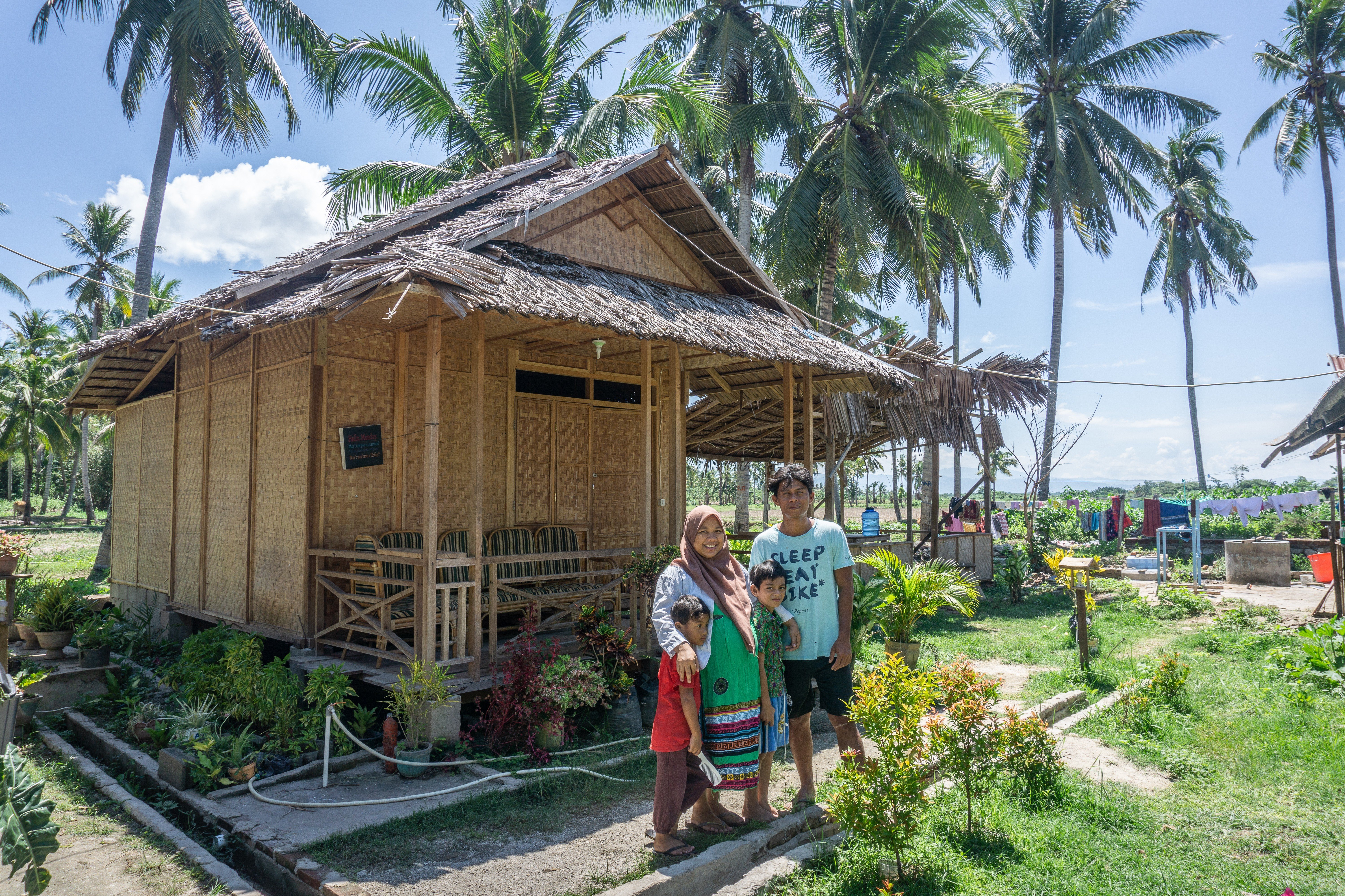 Harry Gobel, his wife Mimin and children at their homestay in his native Gorontalo, in eastern Indonesia. Photo: Ian Morse