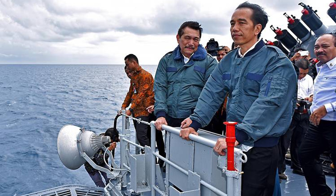 Indonesian President Joko Widodo (right) on board the Imam Bonjol warship with maritime coordinating chief Luhut Panjaitan. Photo: Indonesian President Office