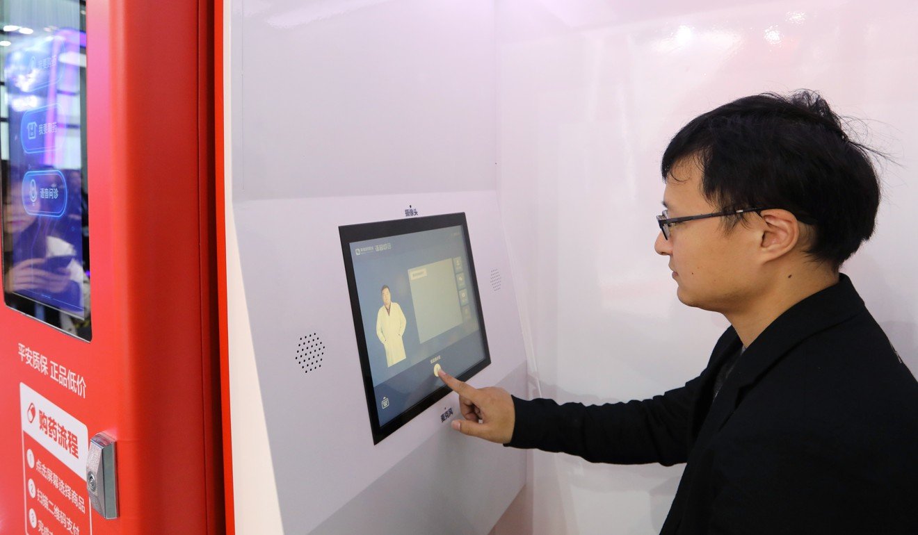 A man talks with a doctor online in an AI-powered 24/7 medical treatment platform booth run by Ping An Good Doctor, in Wuzhen, Zhejiang province. Photo: Simon Song
