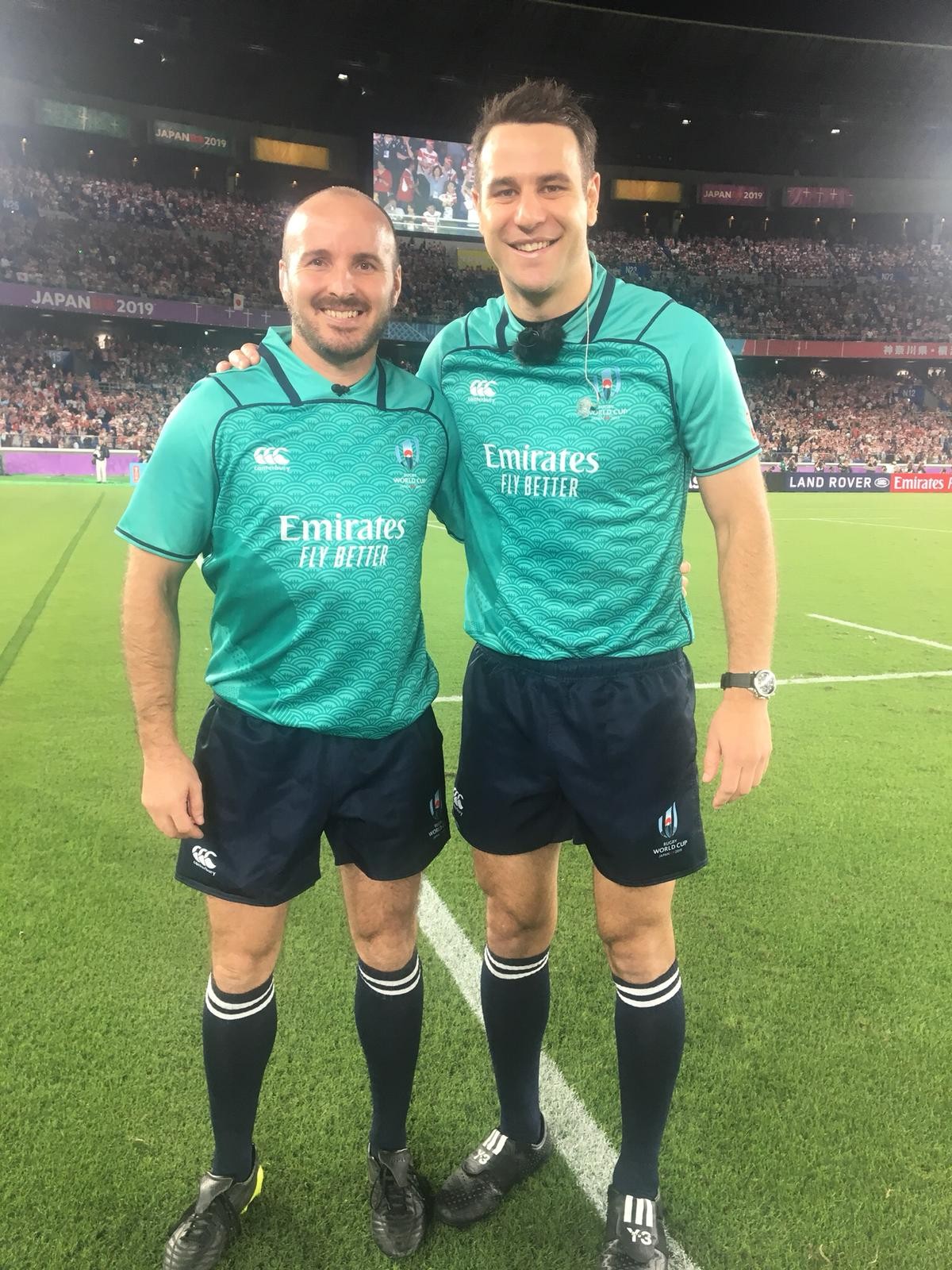 Tim Baker (left) joins old friend Ben O'Keefe in officiating for the Japan vs Scotland match at the 2019 Rugby World Cup. Photo: Handout