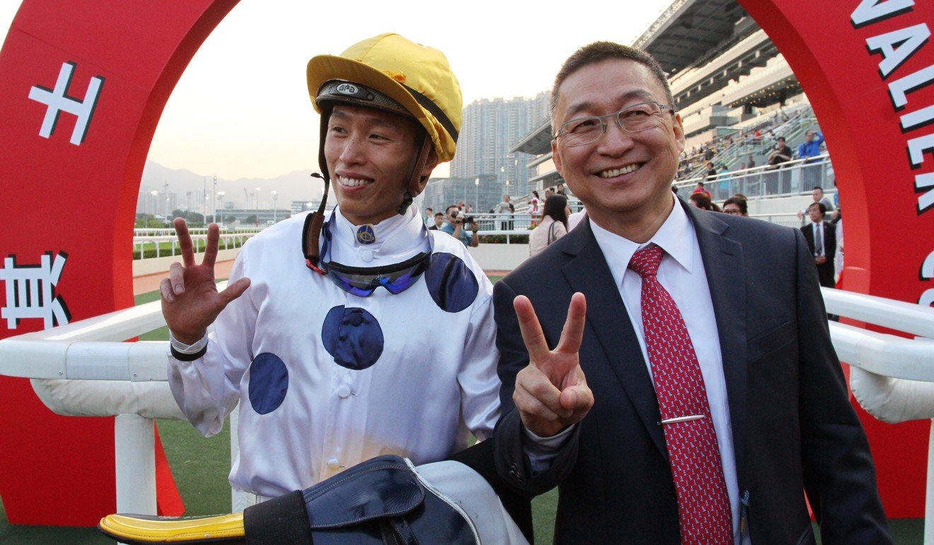 Jockey Vincent Ho and trainer Francis Lui celebrate their double together.
