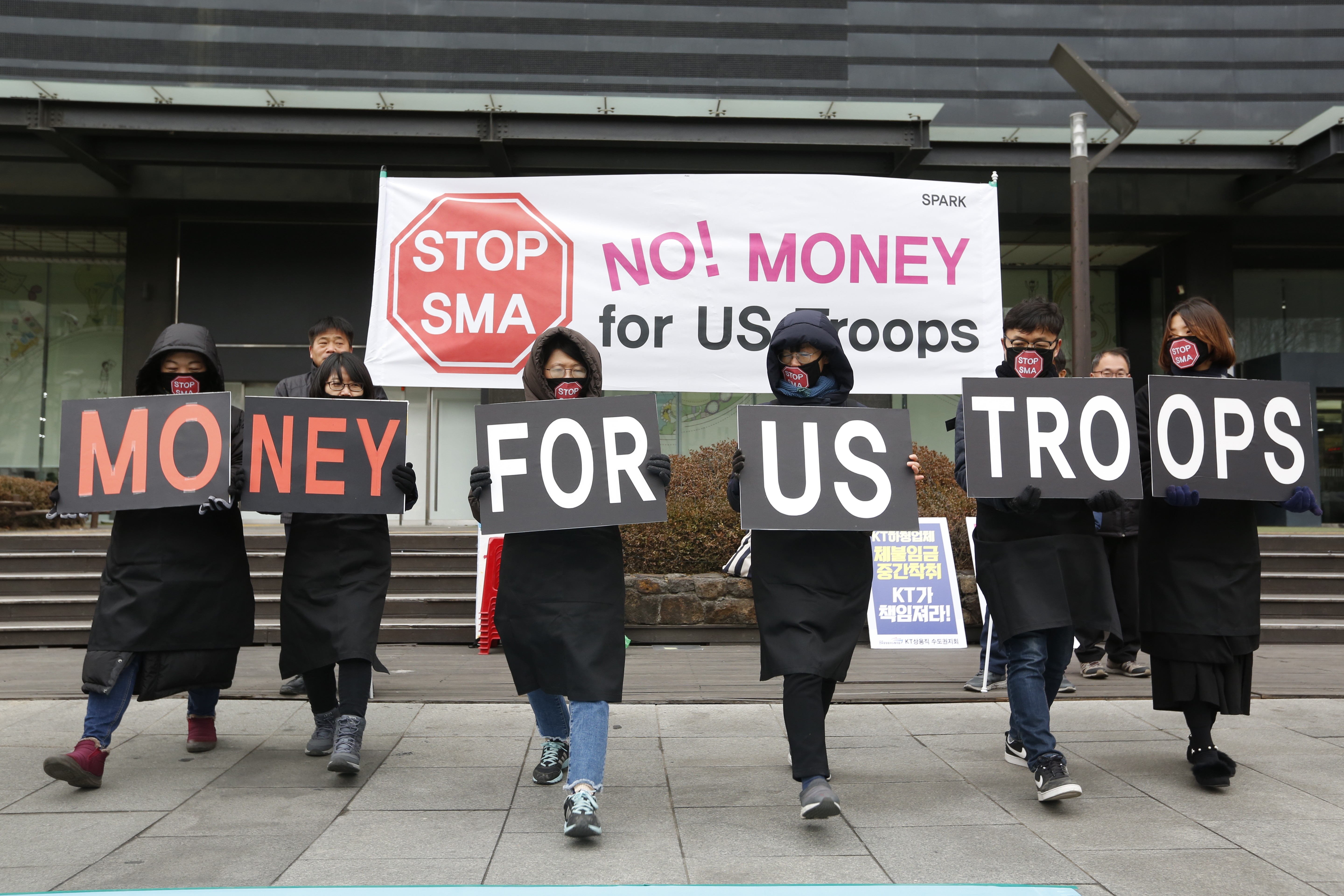 South Korean protesters rally against the government’s financing of US troops. Photo: EPA