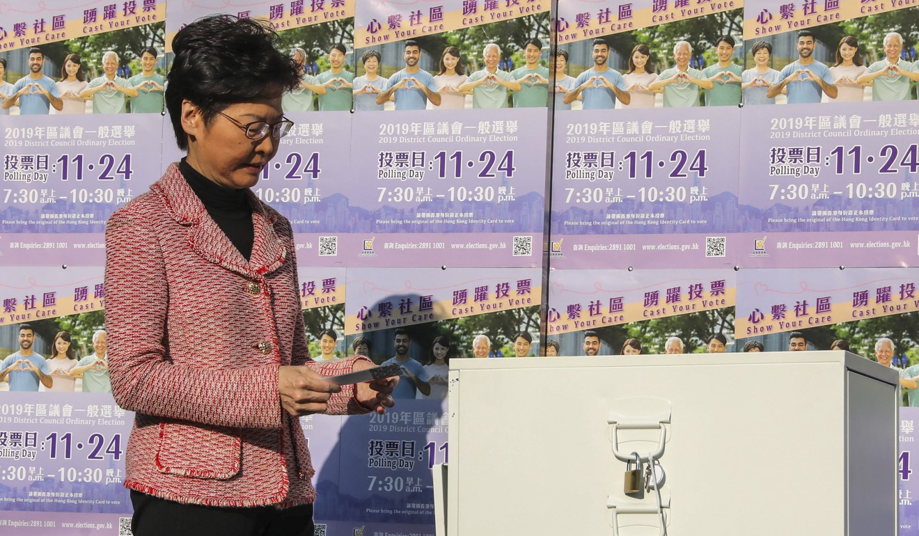 Carrie Lam casts her vote on Sunday. The pro-democracy camp is set to get a larger say in the next election of the chief executive in 2022. Photo: K. Y. Cheng
