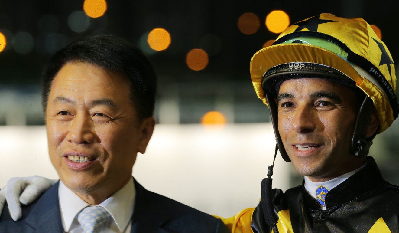 Trainer Ricky Yiu and Joao Moreira after the win of King’s Trooper.