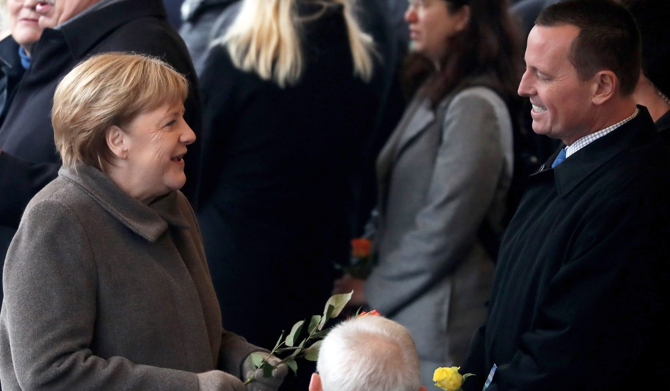 German Chancellor Angela Merkel and US ambassador to Germany Richard Grenell at the celebration of the 30th anniversary of the fall of the Berlin Wall on November 9. Photo: EPA-EFE