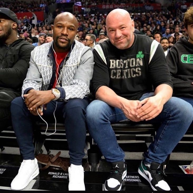 Floyd Mayweather Jnr sits with Dana White at an NBA game between the Los Angeles Clippers and the Boston Celtics. Photo: Instagram